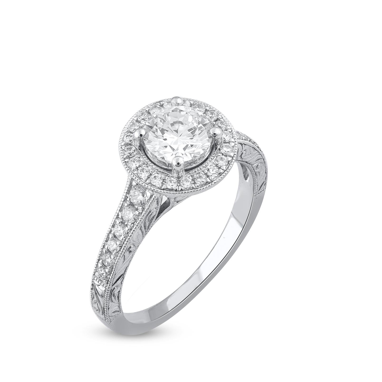 Stunning and classic, this diamond ring is beautifully crafted in 18 karat Solid White gold. The engagement ring features 0.80 ct. of center stone and 0.30 ct. diamond frame and shank lined sparkling white diamonds set in secured prong and