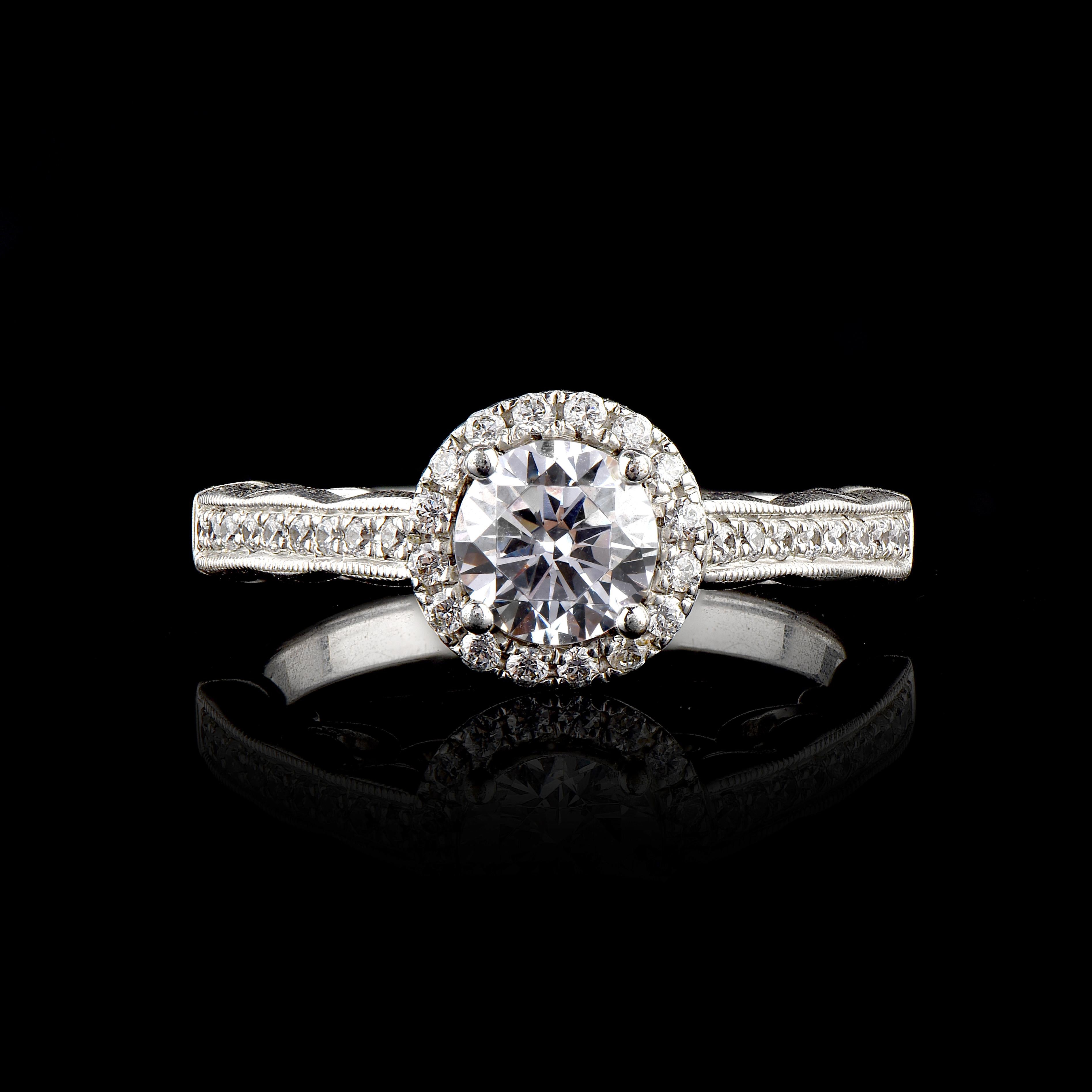 Give a touch of glamour to your fine jewelry collection with this diamond engagement ring. It features 0.80 ct centre stone and 0.30 ct diamond frame and shoulders embellished with 37 round cut diamond set in micro-prong, prong and pave setting.The