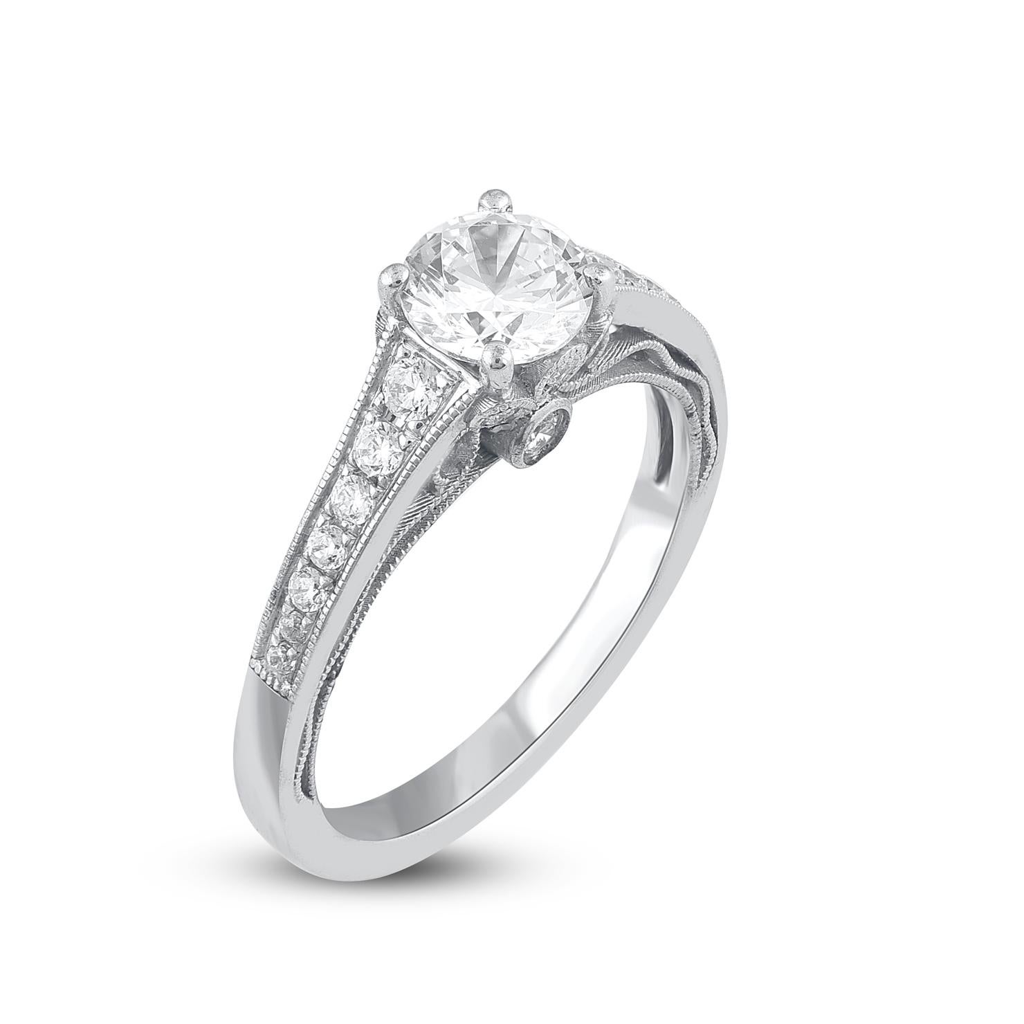 Sparkling with all your wonderful moments, this diamond engagement ring is shining symbol of your commitment. Crafted in 18 karat white gold, this engagement ring features 0.80 ct center stone and 0.313 ct of diamond frame and shank lined diamonds