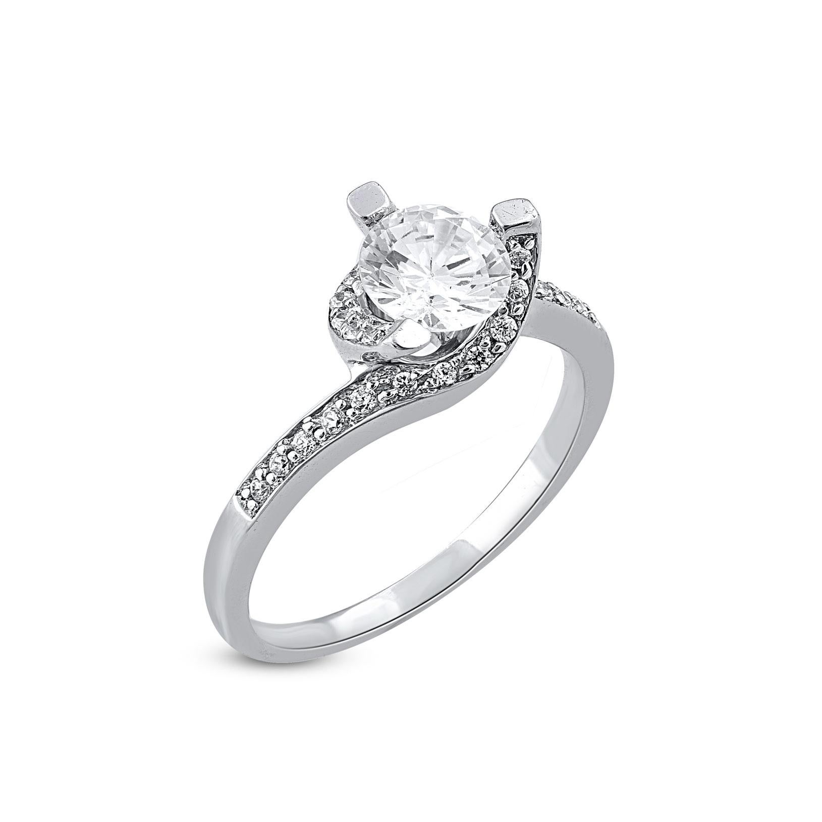 Bring charm to your look with this engagement ring. This ring is features 1.00 ct Centre stone and 0.12 ct shoulder diamonds and its crafted in 18 karat gold and features 25 round diamond set in pave setting and it shines in G-H color SI1 clarity.