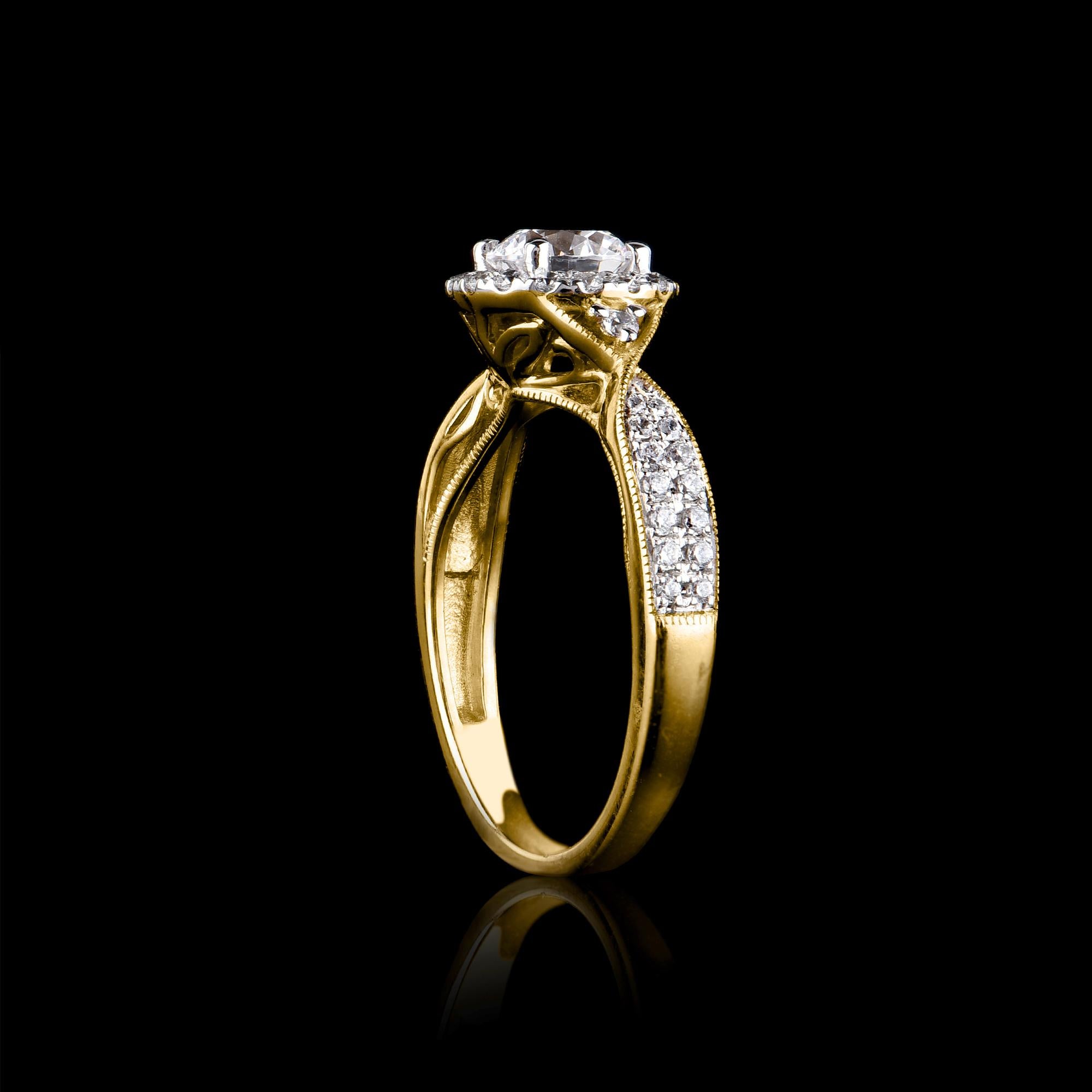 This Engagement Ring is expertly crafted in 18 Karat yellow gold and features 0.80 ct centre stone and 0.35 ct diamond frame and shank lined diamond set in micro-prong and prong setting. The diamonds are natural, not treated and dazzles in G-H color