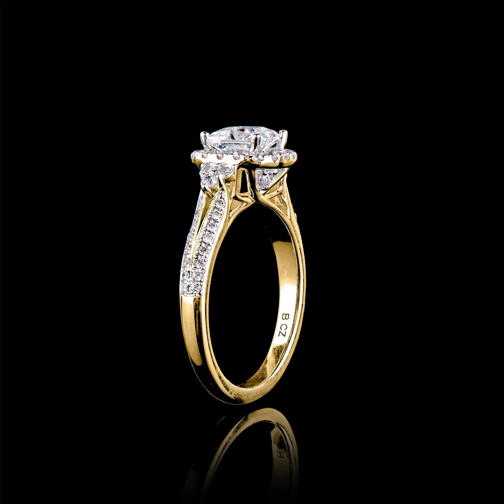 Exquisite diamond engagement ring features 0.80 ct centre stone and 0.43 ct of diamond frame and split shank lined diamonds. Expertly Crafted of sparkling 18 karat solid white gold in high polish finish and set with 56 sparkling round and 1
