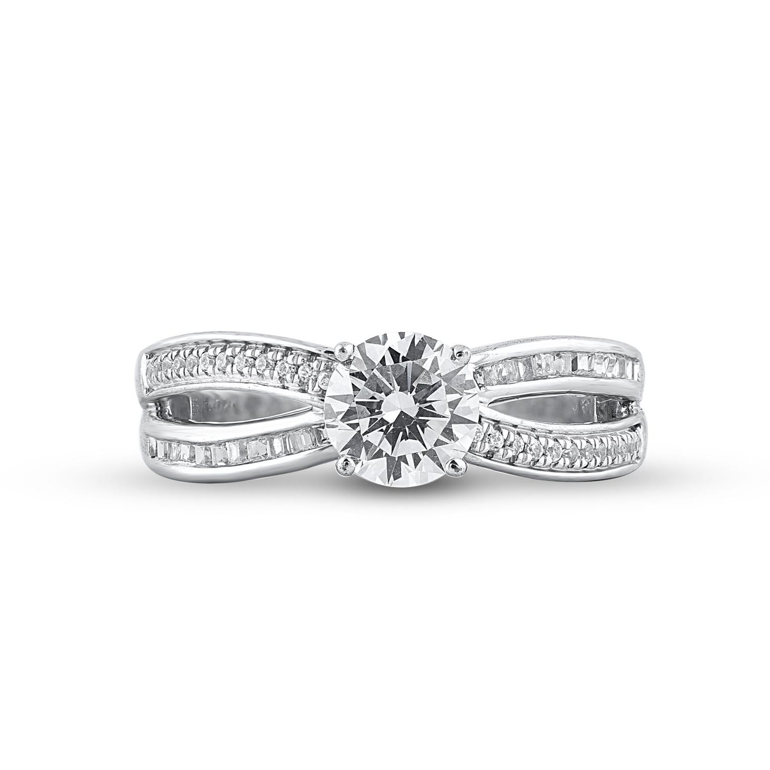 Express your love for her in the most classic way with this engagement ring. This ring is expertly crafted in 14 Karat white gold and features of this ring 51 brilliant cut, single cut and baguette cut diamond set in pave, prong & channel setting.