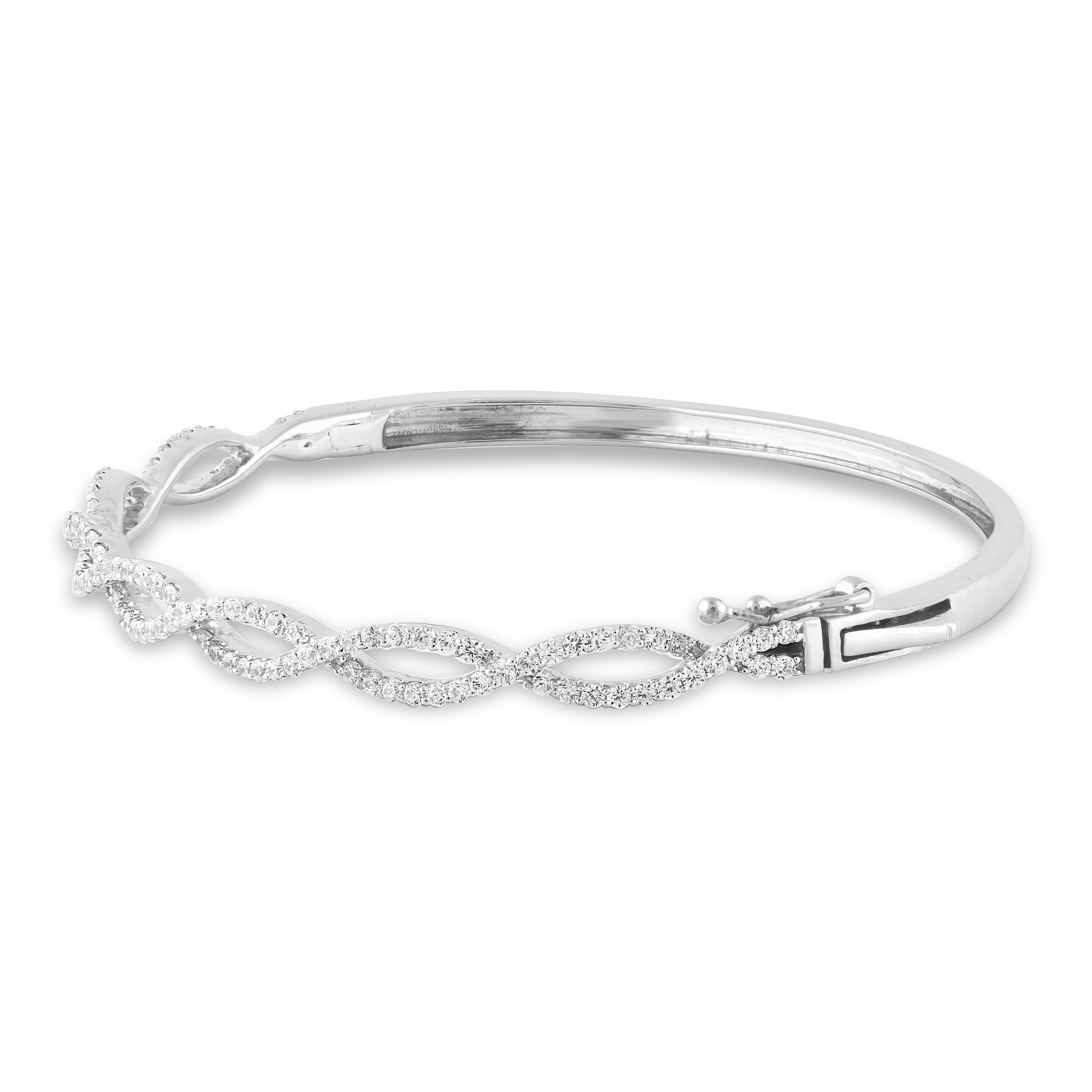 Elegant and alluring, these designer diamond tennis bracelet are perfect for your evening ensemble. Featuring 116 round brilliant-cut diamond set in prong setting and crafted by our inhouse experts in 14 Karat White Gold. The total weight of
