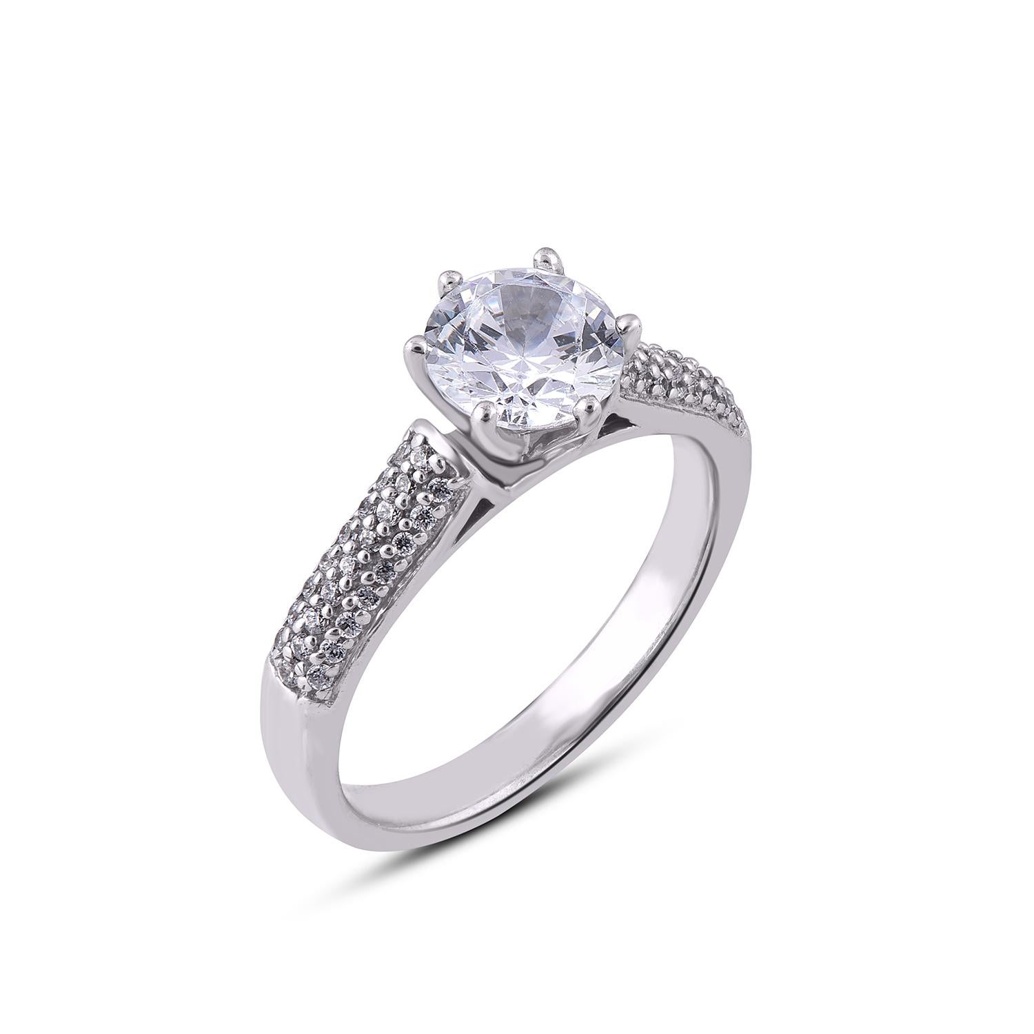 This Solitaire Engagement Ring is expertly crafted in 18 Karat white gold and features 1.00 ct centre stone and 0.25 ct diamond frame and shank lined with 50 diamond set in prong and pave setting. The diamonds are natural, not treated and dazzles in