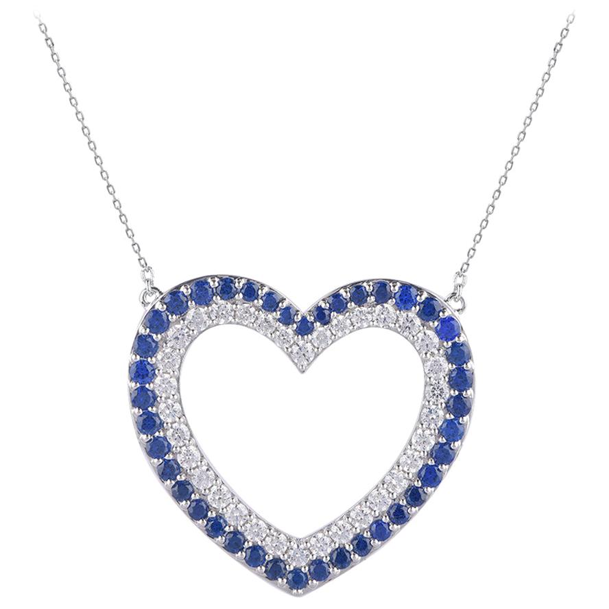 Pendentif cœur ouvert en or blanc 14 carats avec saphir bleu Nat de 1,35 carat et diamant rond TJD