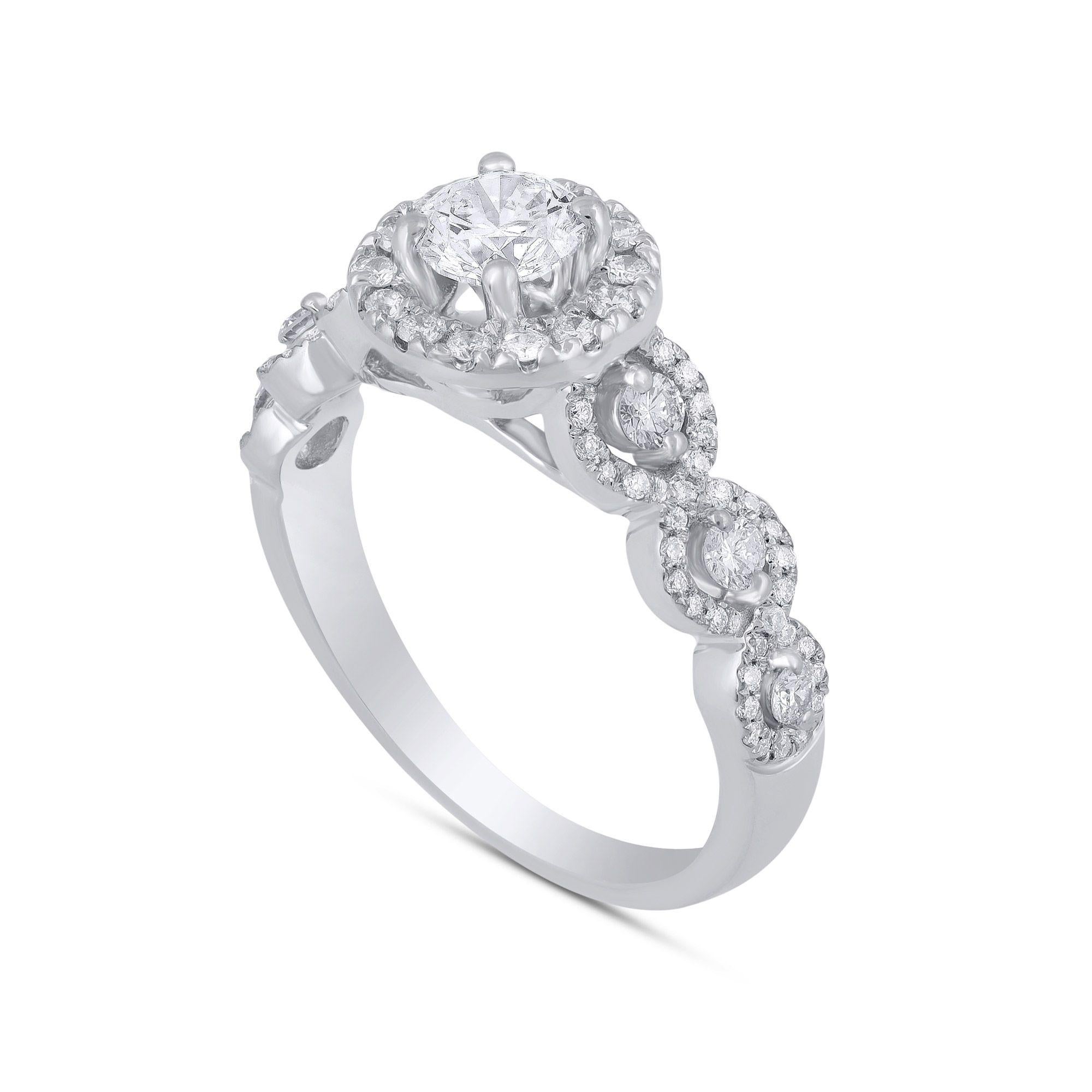 A gorgeous 14 karat White Gold Diamond Bridal Ring studded with 85 diamonds in prong and pave setting. Diamond grading - G-H Color, I1-I2 Clarity.
