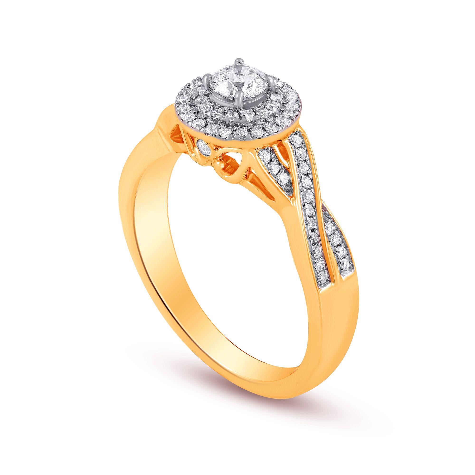 A beautifully designed engagement halo ring studded with 76 diamonds in prong, micro-pave and bezel setting. The ring is crafted in 14 Karat Yellow Gold. The ring is available in multiple sizes.  Diamonds are graded G-H Color, I1-I2 Clarity. 
