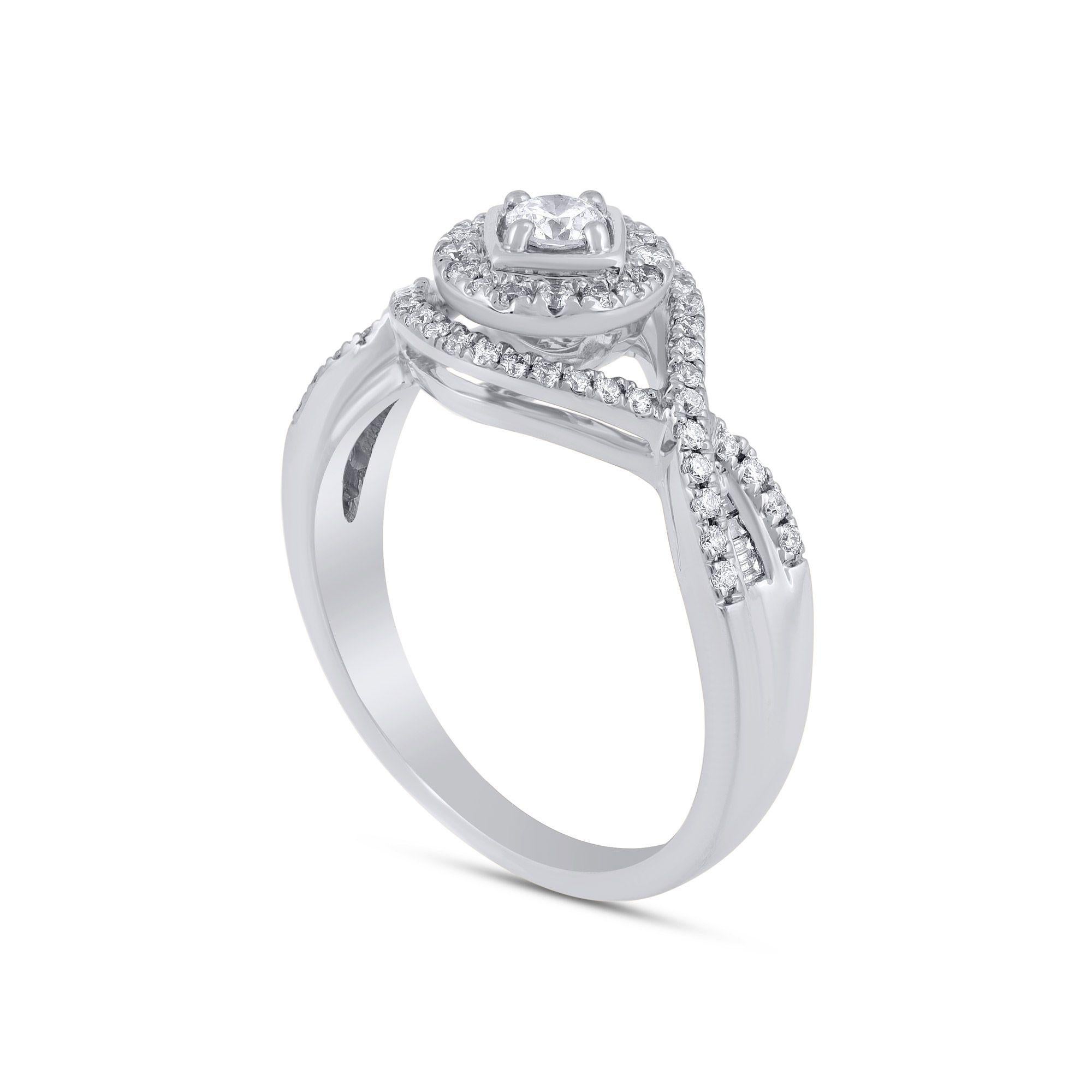 A unique designer Engagement Ring studded with 71 diamonds in prong, micropave and channel setting. Crafted in 14KT gold and diamonds are graded I-J Color, I1-I2 Clarity. 
