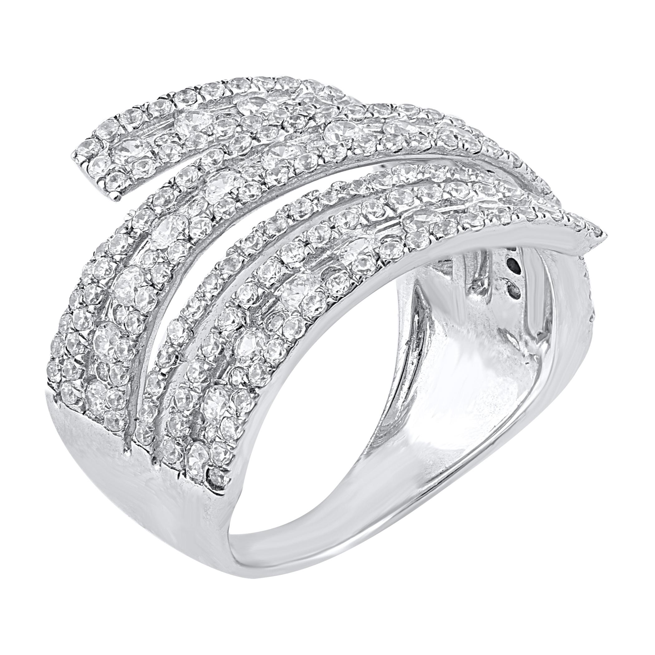 A meaningful symbol of your never ending commitment. This ring is beautifully designed in 14 karat white gold and studded with 293 brilliant cut and single cut round diamond in prong and channel setting. The white diamonds are graded as H-I color