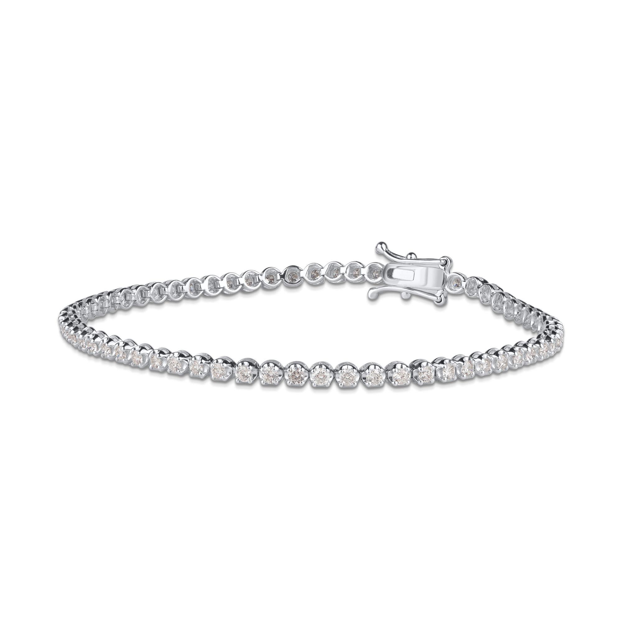 Stunning and elegant, this diamond tennis bracelet is studded with 62 round diamonds in prong setting and crafted in 18 KT white gold. Diamonds are graded HI color, SI3 clarity. 