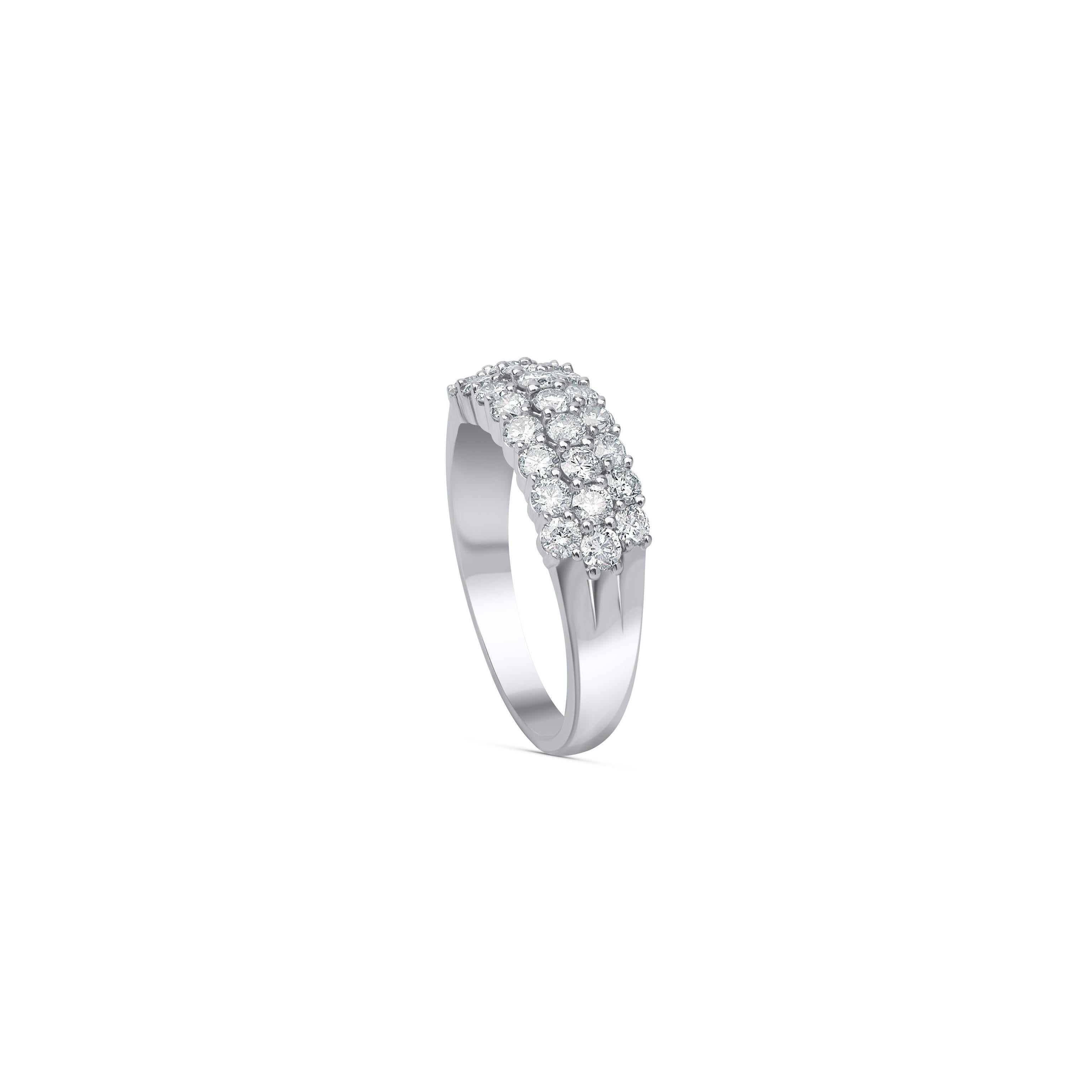 This diamond anniversary band is embellished with 25 brilliant diamonds set in prong setting and made by our in-house experts in 10KT white gold. Will add a beautiful sparkle to your look. The diamonds are graded H-I color, I2 clarity.

Metal color