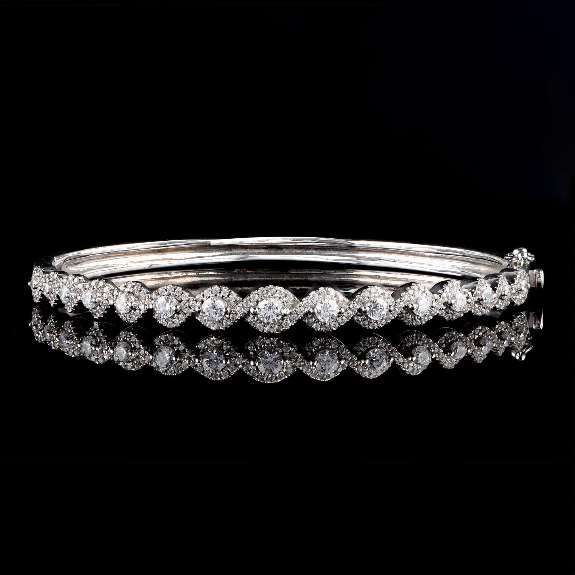 Modern TJD 1.50 Carat Diamond 18 Karat White Gold Braided Designer Bangle For Sale