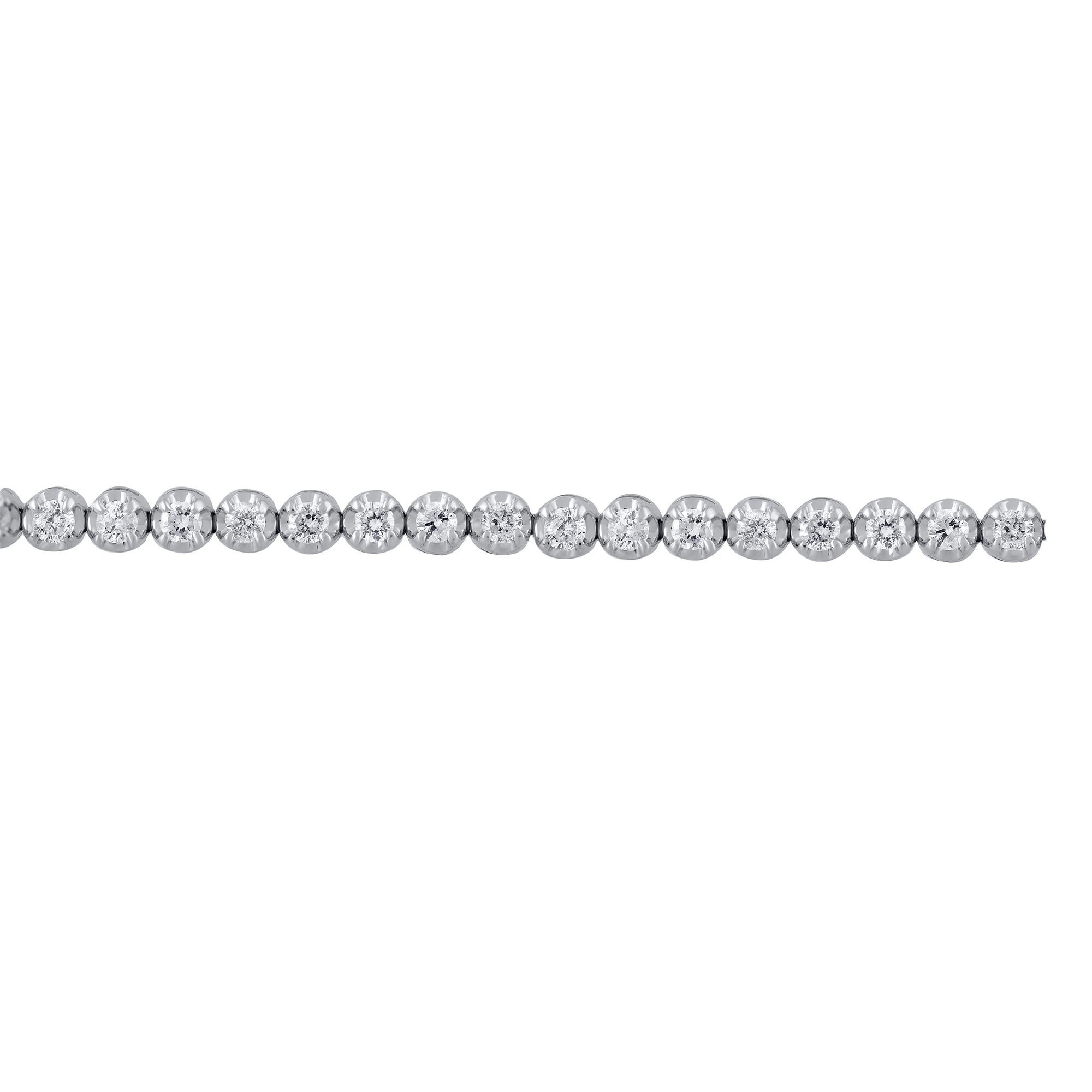 This stunning tennis bracelet is perfect for everyday wear. It is studded with 62 brilliant cut diamonds in crown prong setting and crafted in 14 karat white gold. Diamond are graded H-I Color, I2 Clarity. Bracelet secures firmly with a box clasp.