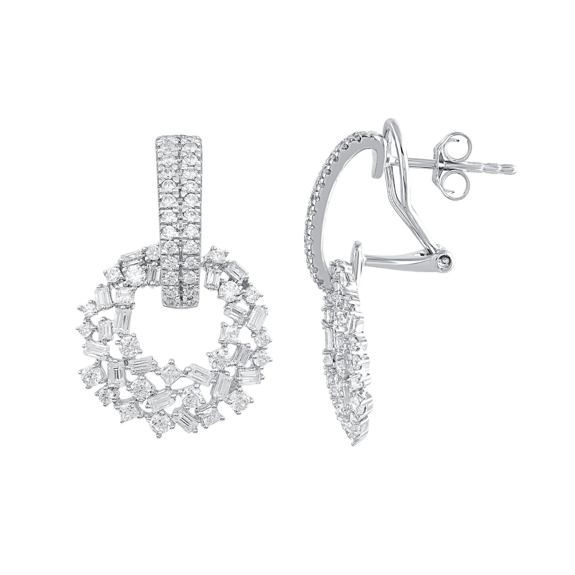 The perfect complement to her classic style, this diamond dangle earrings shines with your happily ever after. These earrings studded with 134 round, princess and baguette cut diamond in prong setting. Total diamond weight is 1.50 carat. These