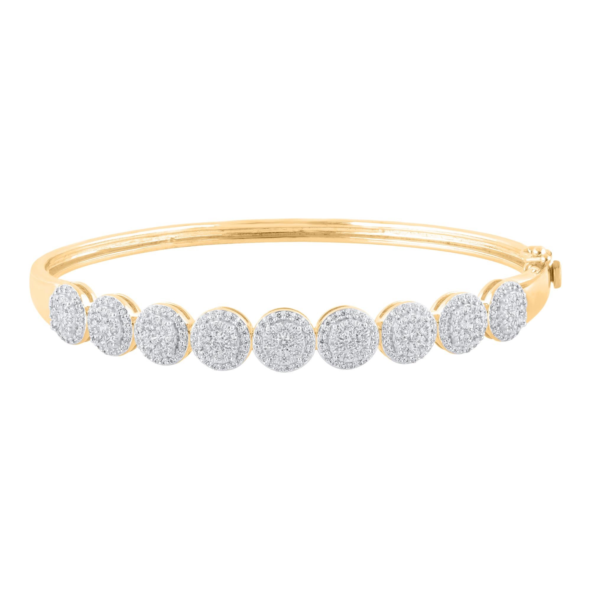 Simply stunning, this diamond bangle adds easy elegance to your casual and dressy attire. Made by our skilful craftsmen in 14 Karat yellow Gold and studded with 243 round brilliant-cut and single cut natural diamond set in prong setting. The total