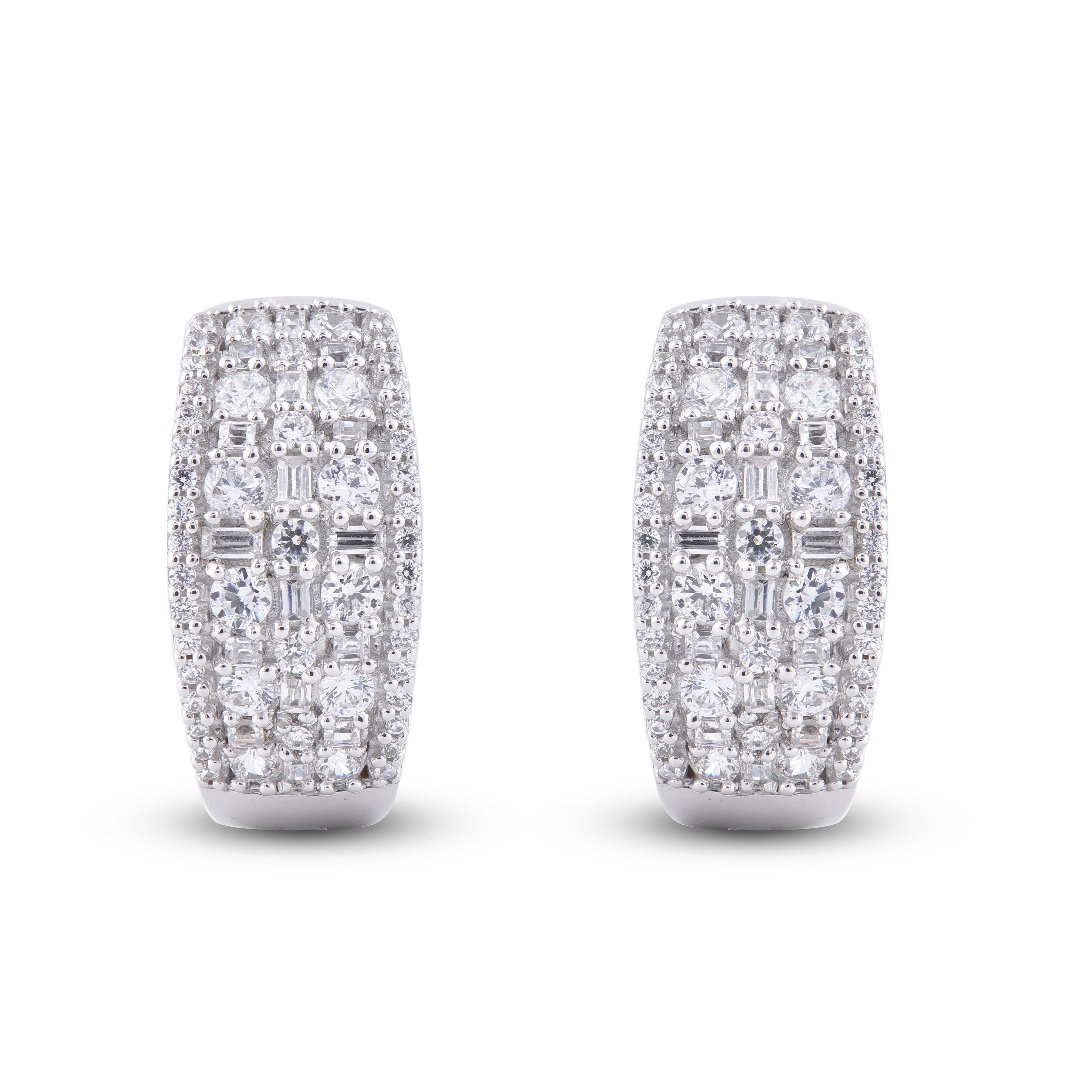 This Sparkling Baguette and White Round Diamonds earrings gives great presence on the ear. This earring is fashionated with 102 round white diamond and 32 Baguette diamond in 14 karat white gold shines with in H-I color I2 clarity. it secures