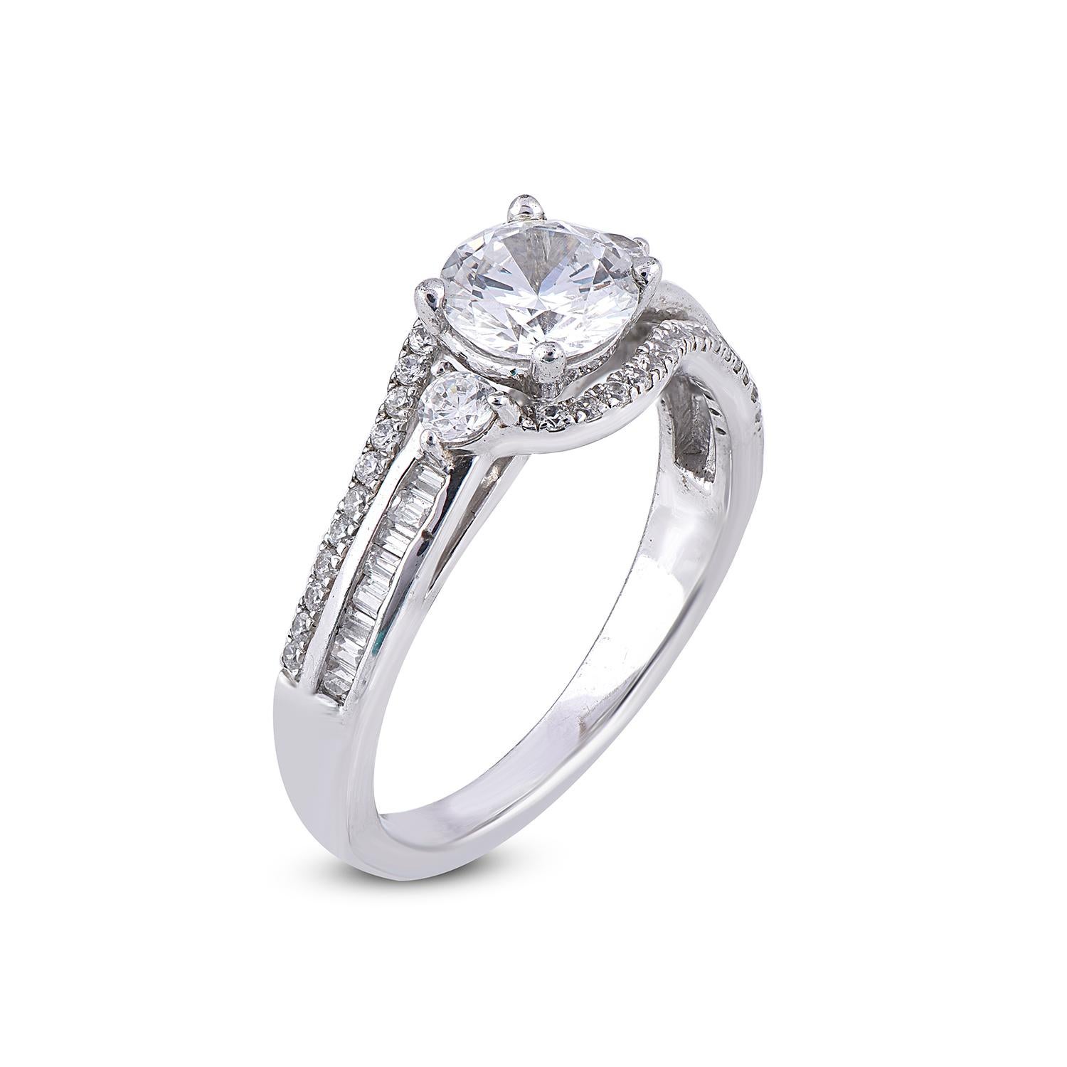 Truly exquisite, this entangled design 18 Karat white gold diamond engagement ring is sure to be admired for the inherent classic beauty and elegance within its design. This engagement ring features 1.0 ct of center stone and 0.50 ct of shank lined