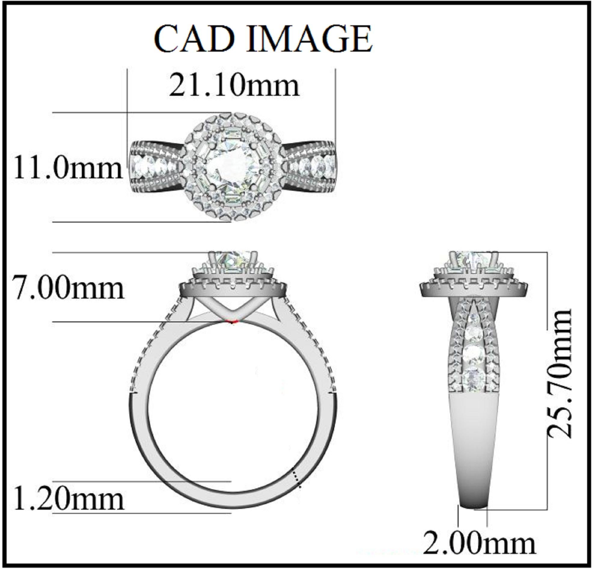 La bague de fiançailles, tout simplement magnifique, comporte une pierre centrale de 0,65 ct et 0,85 ct de diamants ronds de taille baguette et de diamants doublés sur la tige fendue. Cette bague est fabriquée à la main en or blanc 18 carats et