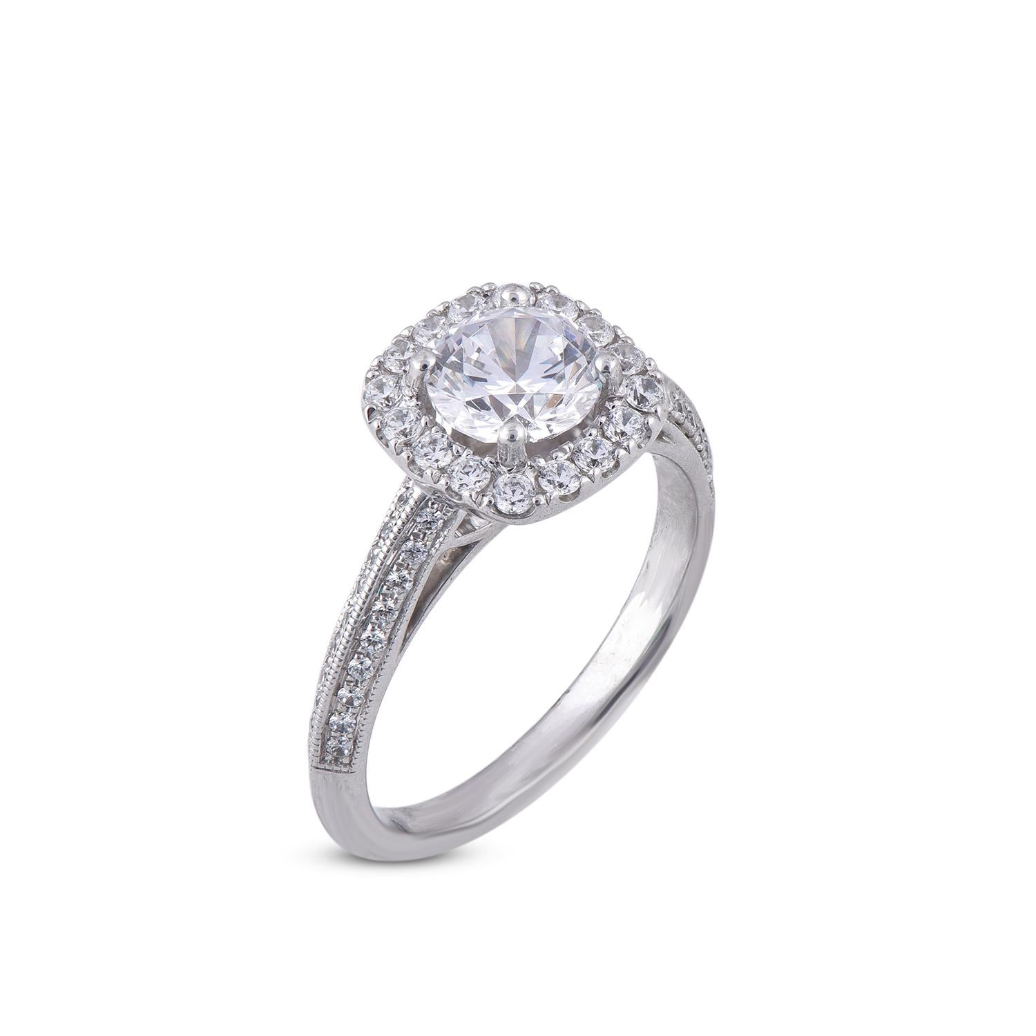 This Cushion shape Halo engagement Ring is expertly crafted in 18 Karat White Gold and features 1.00 ct centre stone and 0.50 ct of diamond frame and shank with prong setting. The diamonds are natural, not treated and dazzles in G-H color SI1-2