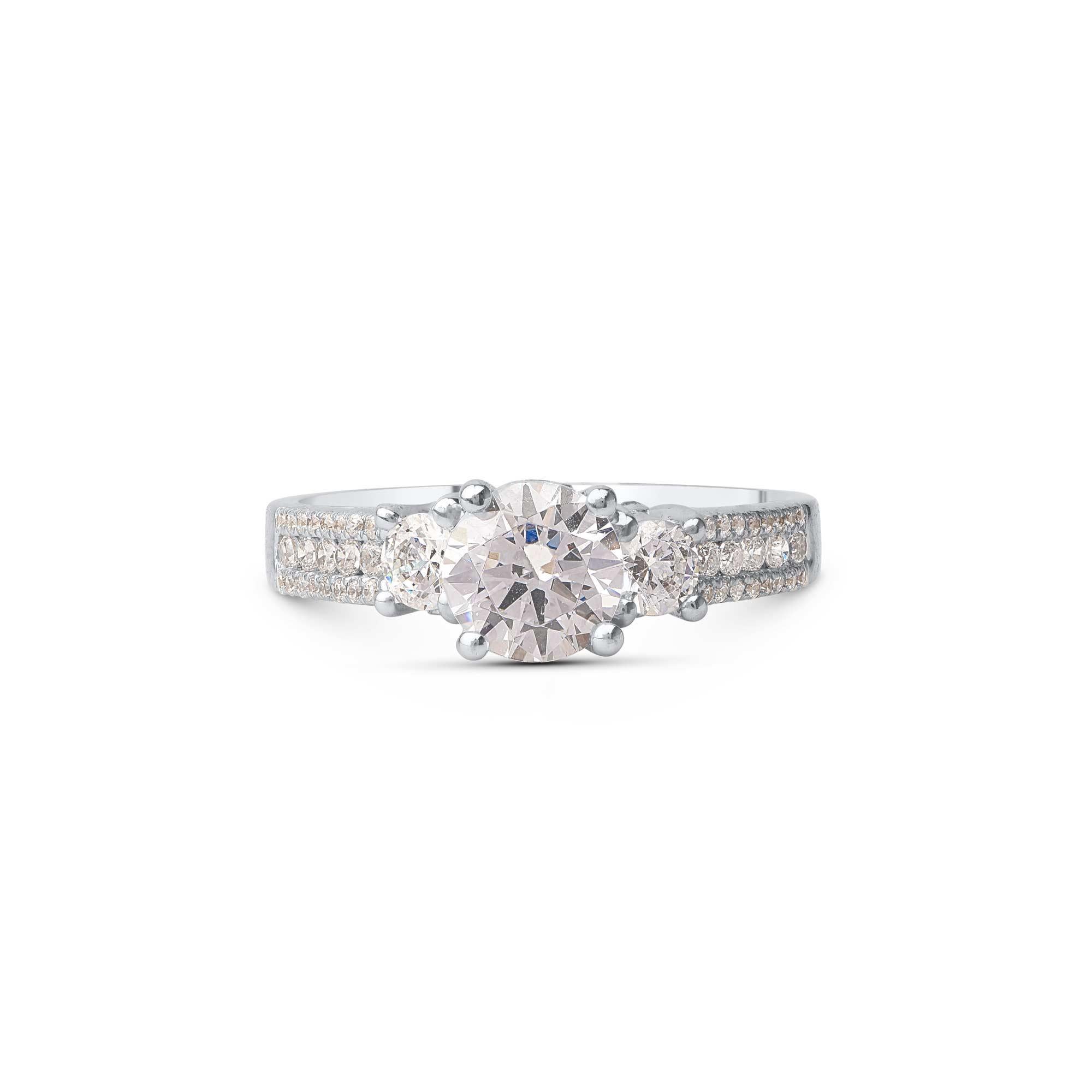 This dazzling design features 51 brilliant cut diamonds in prong, channel and bezel setting - crafted by our skillful artisans in 18-karat white gold. Diamonds are graded H-I Color, I1 Clarity. 

Metal color and ring size can be customized on