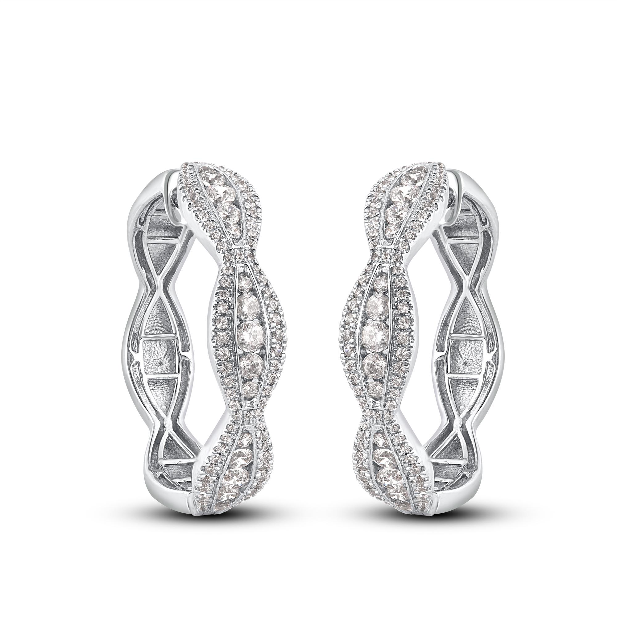 Wow her with the dazzling good looks of these diamond hoop earrings. Crafted to perfection in 18 karat white gold and studded with 186 round brilliant diamond set in micro-prong and channel setting, and shines in H-I color I1 clarity. Captivates