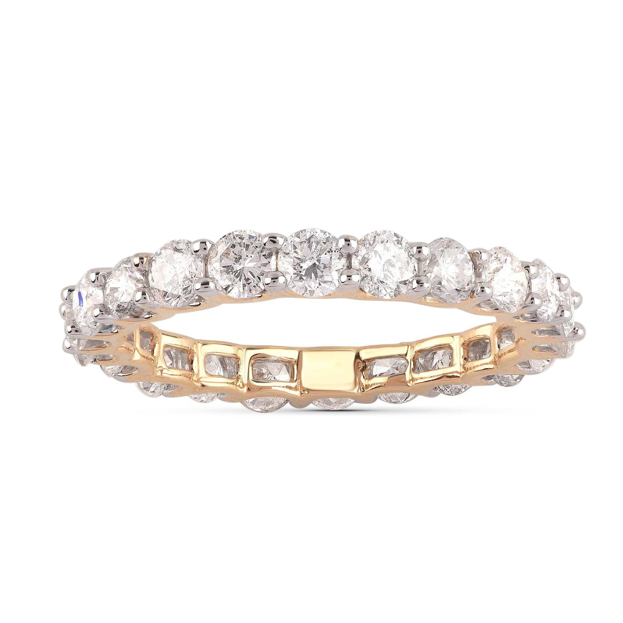 Esta alianza de eternidad completa brilla con 22 diamantes de talla brillante bellamente engastados en montura de garras y fabricados en oro amarillo de 18 quilates. Los diamantes son de color H-I y pureza I2. 

El color del metal y el tamaño del