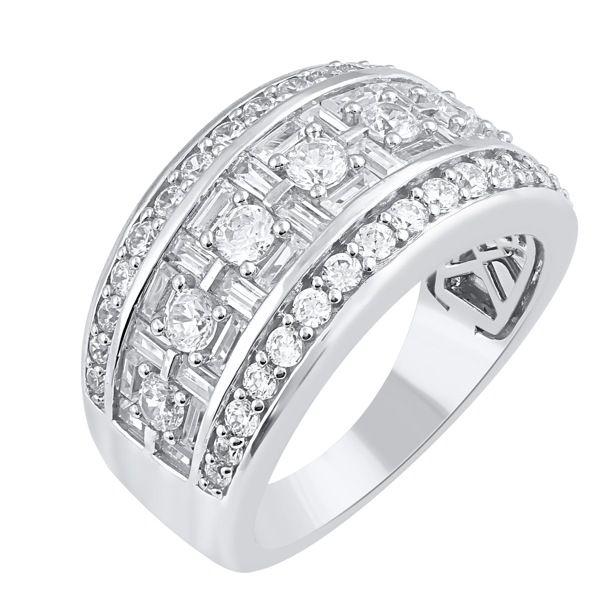 Complete your bridal look with a timeless design. These beautiful wedding band ring is studded with 69 brilliant cut and baguette cut natural diamonds in pave & channel setting. Crafted in 14 karat white gold. The total diamond weight of these