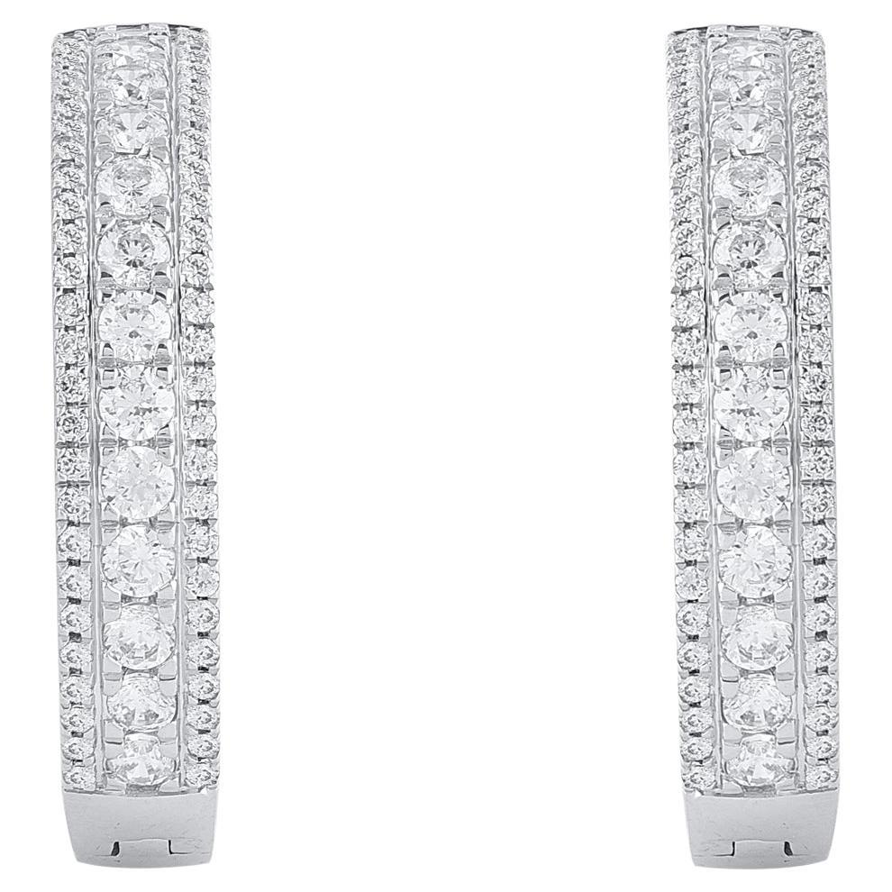 Enhance your day or evening looks when you wear these diamond hoop earrings. Crafted in 14 karat white gold with 210 single cut and brilliant cut round diamond in prong setting. Total diamond weight is 2.0 carat. These earrings secure with hinged