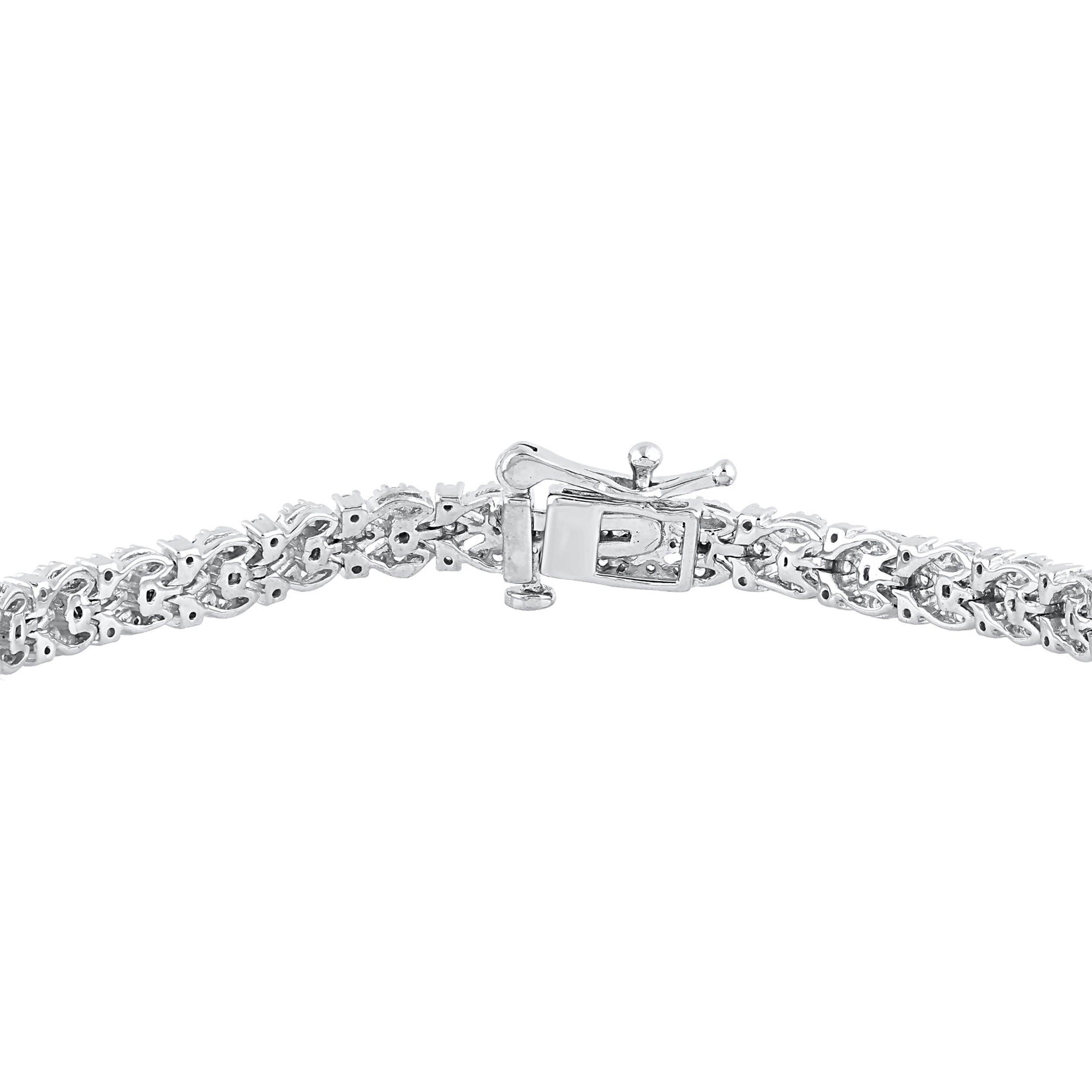 A graceful addition to her wardrobe, this diamond bracelet brings the perfect touch of sparkle to her look. Beautifully hand-crafted by our inhouse experts in 14 karat white gold and embedded with 432 round brilliant and single cut diamond in prong