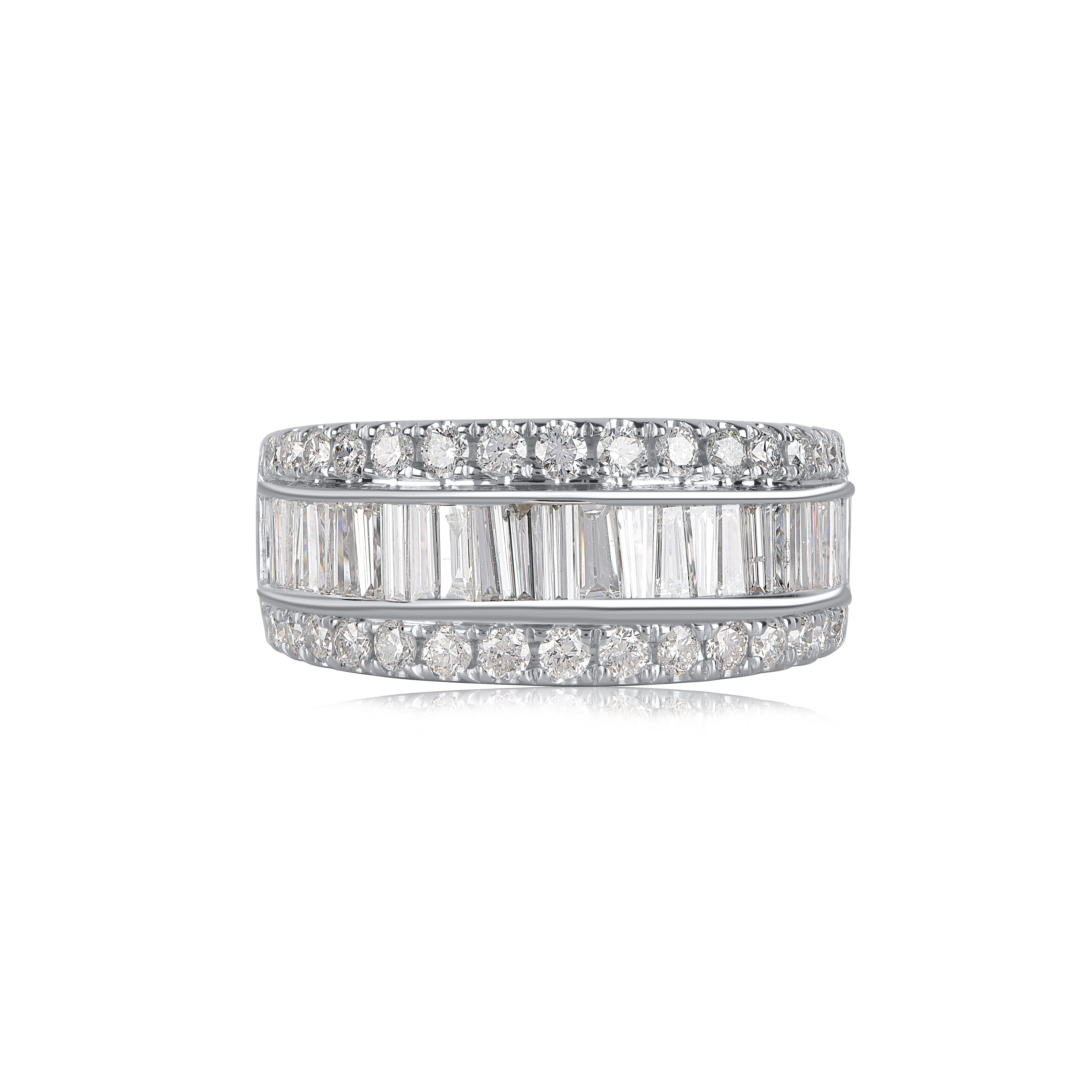 Express your love for her in the most classic way with this band ring. This beautiful ring features shimmering brilliant cut and baguette cut diamonds in prong and channel setting. Crafted in 14 karat white gold. The ring is studded with a total of