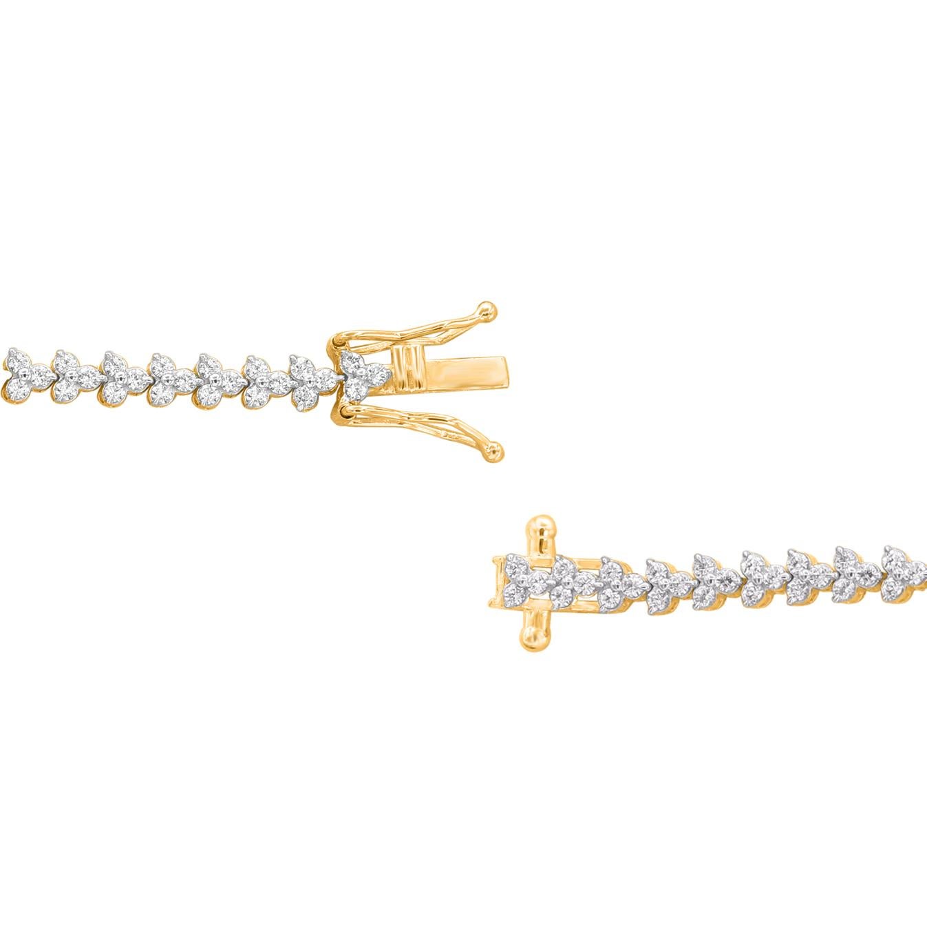A graceful addition to her wardrobe, this diamond bracelet brings the perfect touch of sparkle to her look. Beautifully hand-crafted by our inhouse experts in 14 karat yellow gold and embedded with 186 round brilliant cut diamond in prong setting.