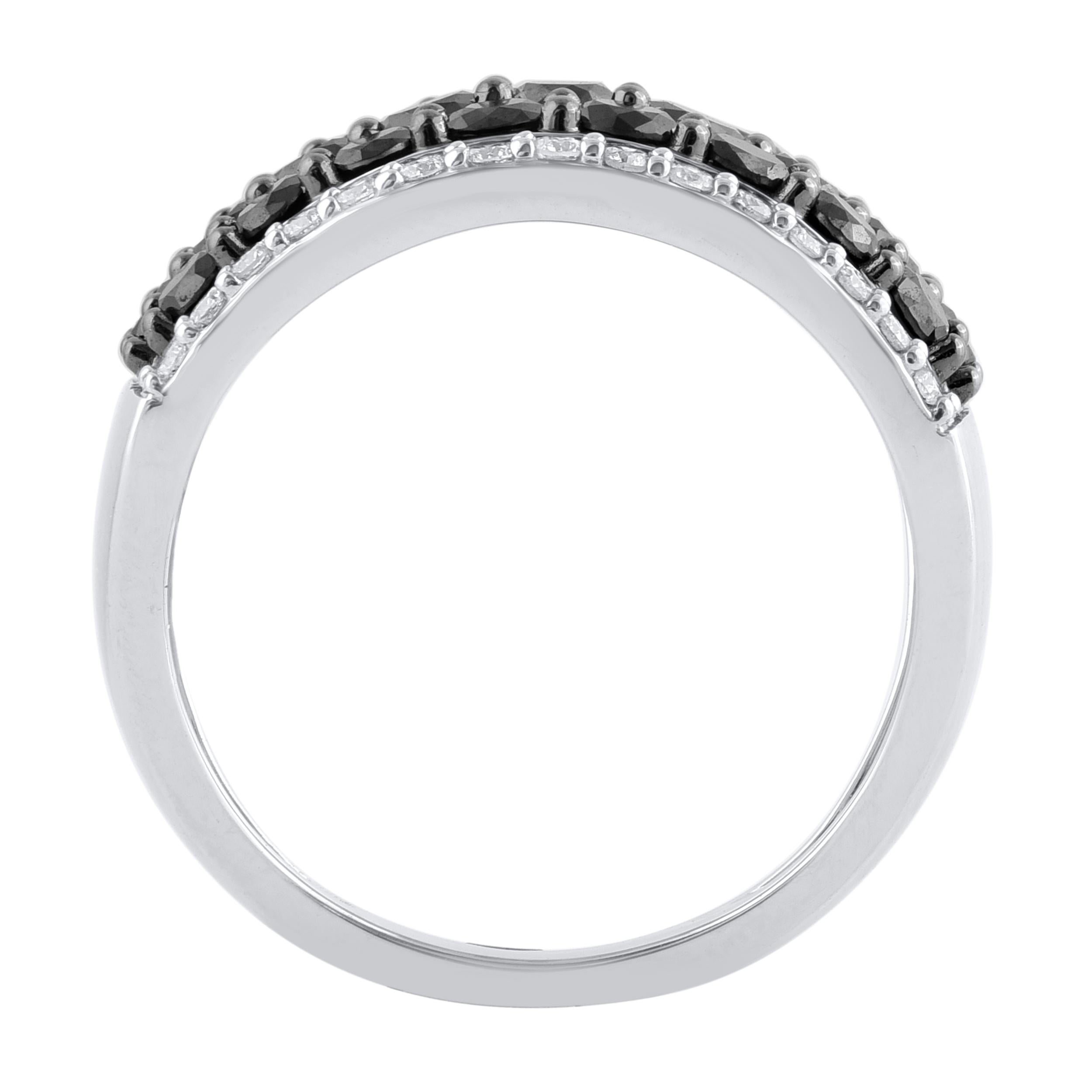 This beautiful multi row wide band ring features shimmering brilliant cut diamonds and treated black diamond in prong setting. crafted in 14 karat white gold. The ring is studded with a total of 55 brilliant cut natural round diamonds and the total