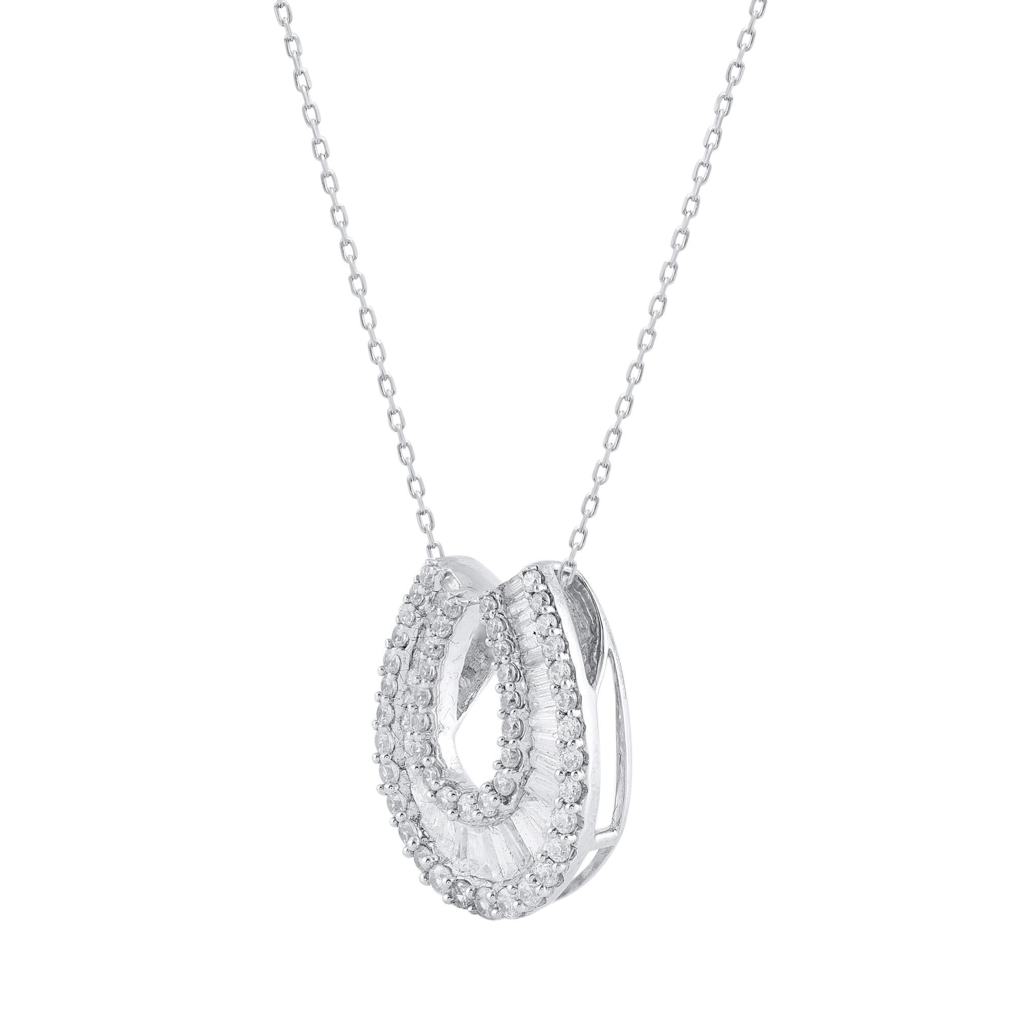 Make a bold statement of style and beliefs with the eye-catching elegance of this diamond pendant.  Beautifully crafted by our inhouse experts in 14 karat white gold and embellished with 75 round brilliant cut & baguette diamond set in prong and