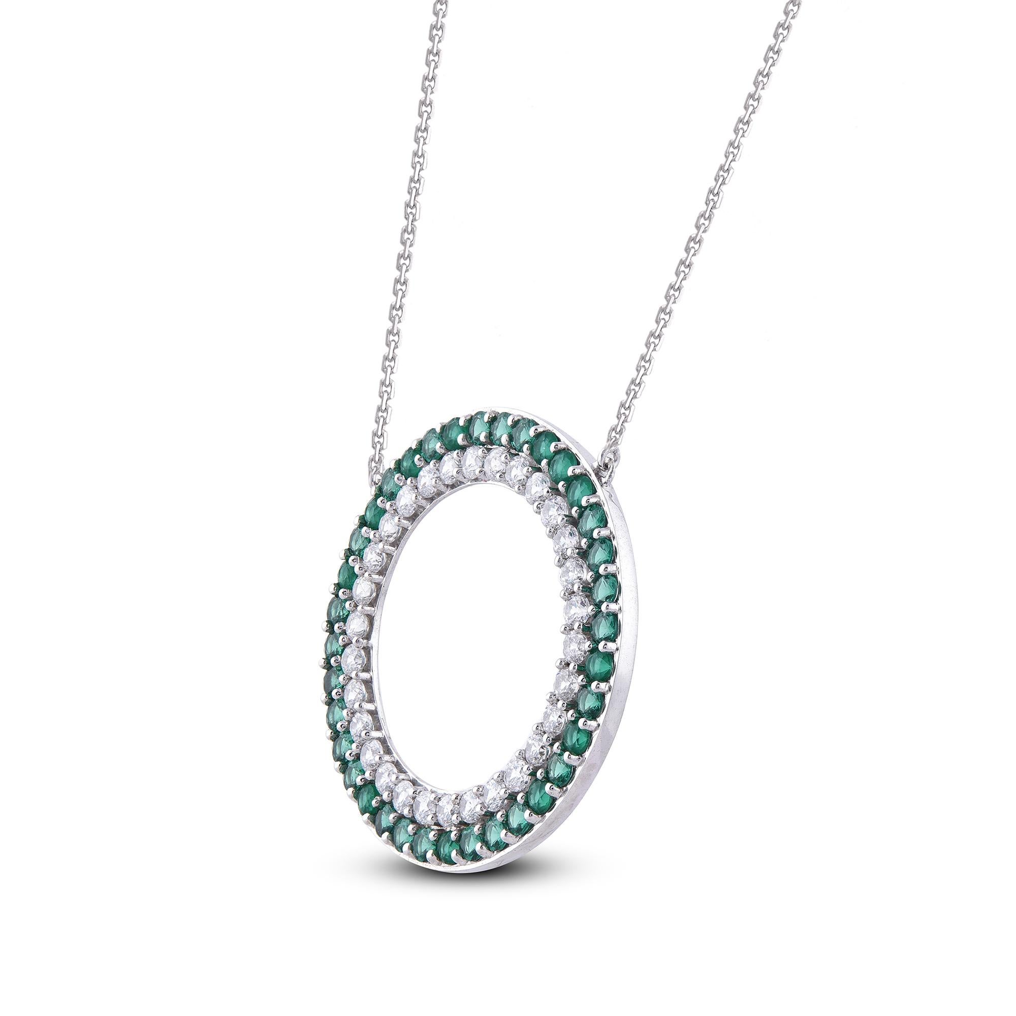 A bright and beautiful choice for any occasion, this sparkling diamond and emerald gemstone pendant gives her a moment to remember. The pendant is crafted from 14 karat white gold and features 30 white diamonds and 36 emerald gemstone, prong set,