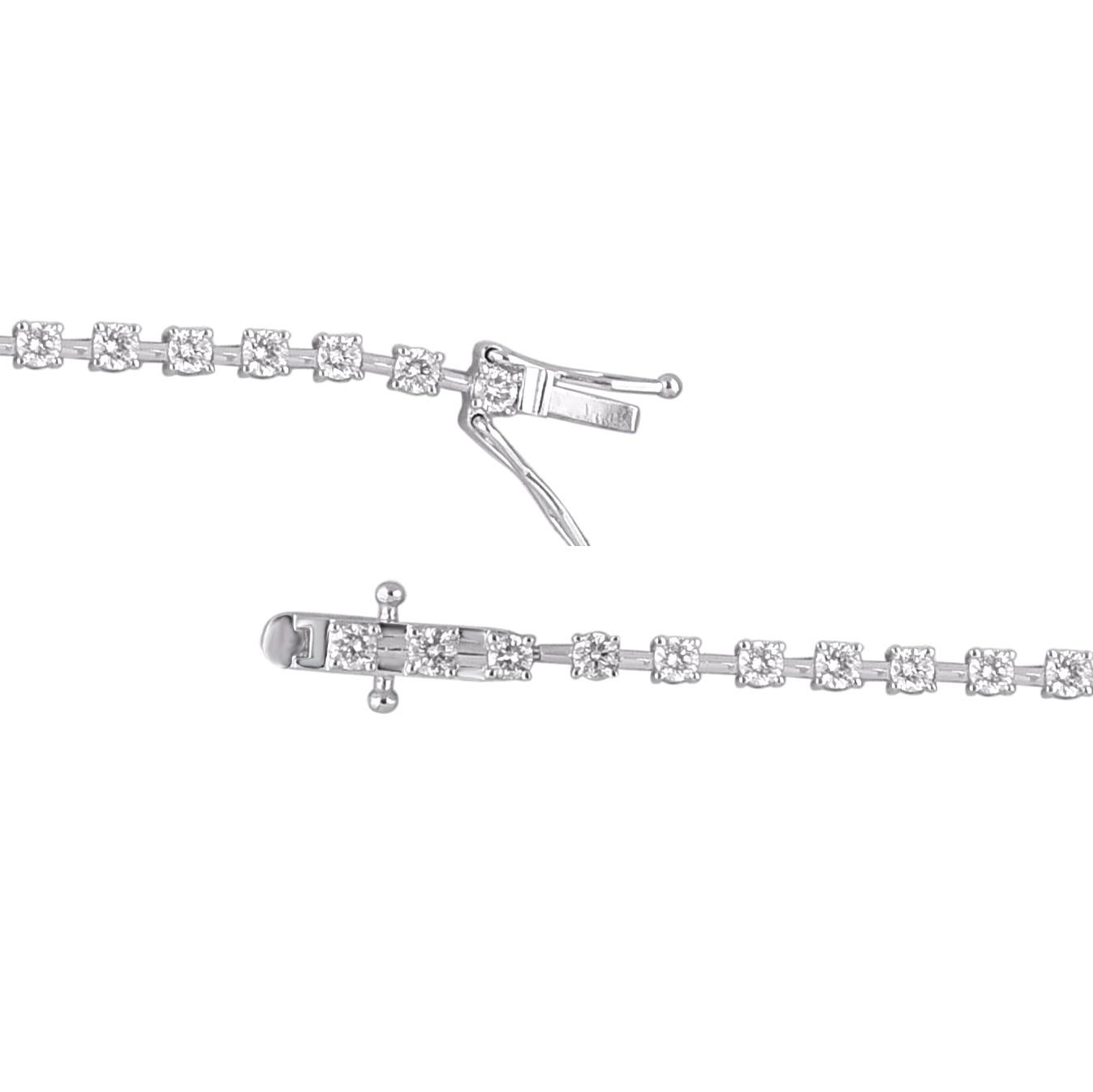 A classic tennis bracelet – perfect accessory for women with everyday attire. Elegantly designed in 14 karat white gold and embellished with 43 brilliant cut natural diamonds in prong setting. Diamonds are graded H-I Color, I2 Clarity.