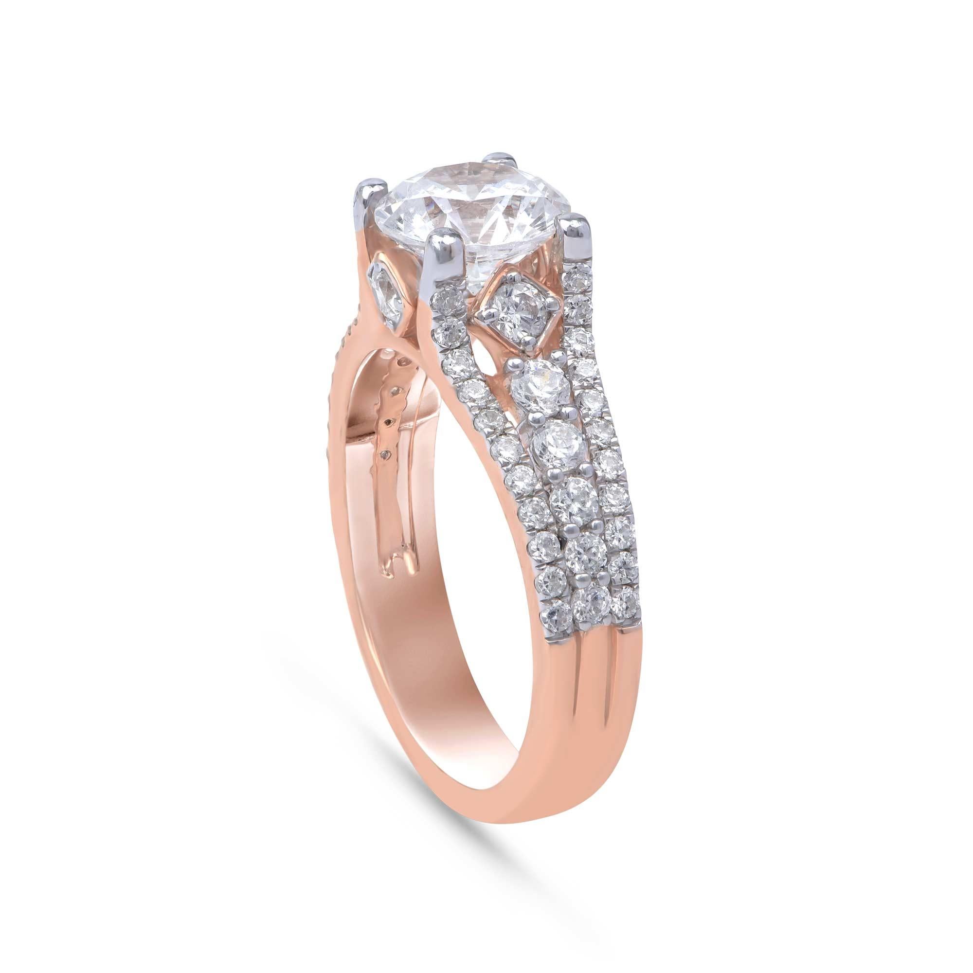 A modern makeover for a classic design, this diamond engagement ring is expertly handcrafted by skillful craftsmen in 18 karat rose gold and accentuated with 59 natural round diamonds set in prong and micro-prong setting. The diamonds are graded H