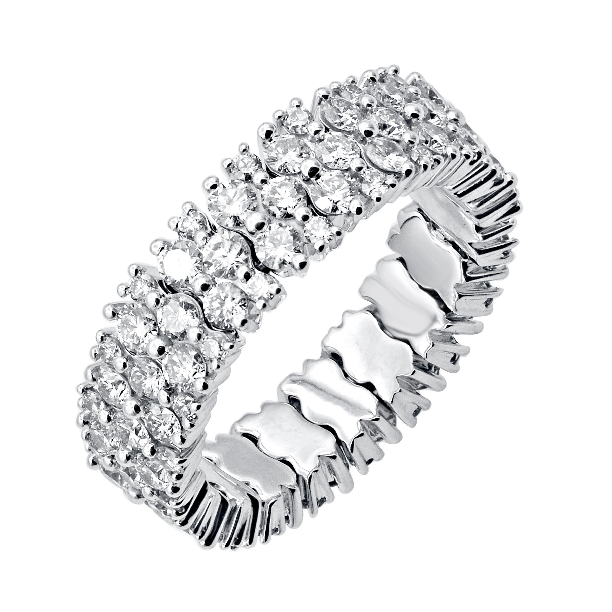 Honor the women you love with this eternity wedding band is expertly crafted in 14 Karat White Gold and features 100 brilliant cut round diamond set in prong setting. This eternity band has high polish finish and is a valuable addition to any