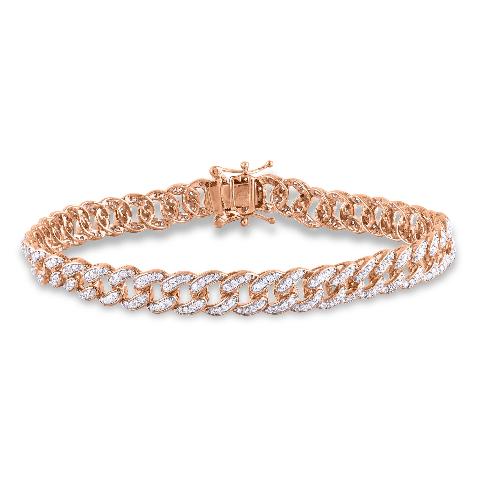 In captivating style, this cable chain bracelet adds an alluring look to any outfit. Expertly handcrafted by our inhouse experts in 14 karat yellow gold and studded with 355 round brilliant diamond set in pave setting. The total diamond weight is