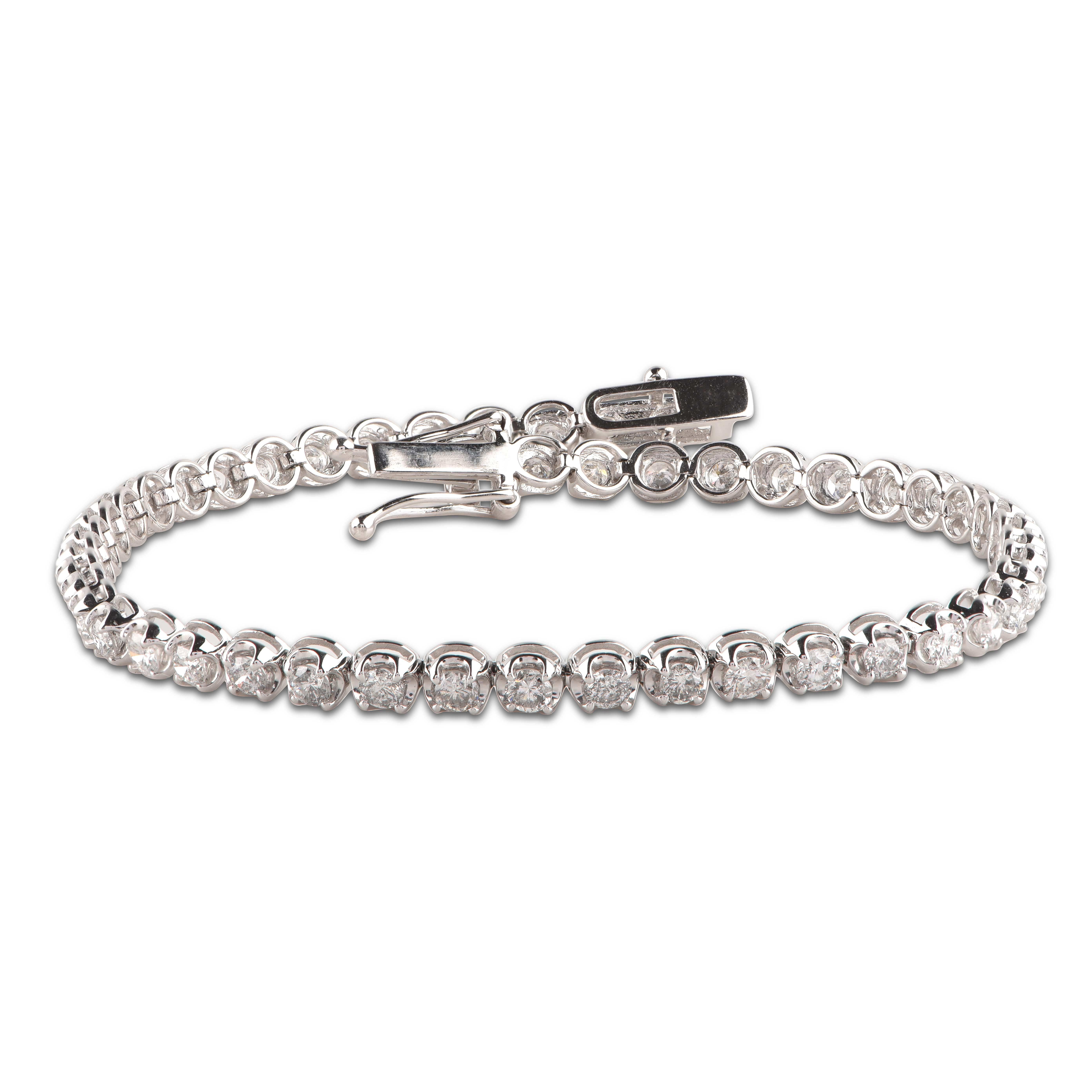 This bracelet dazzles with 48 brilliant cut diamonds set beautifully in prong setting and crafted by our skillful craftsmen in 14-karat white gold. The diamonds are graded H-I Color, I3 Clarity.  

This piece is made to order, please allow 2-3 weeks