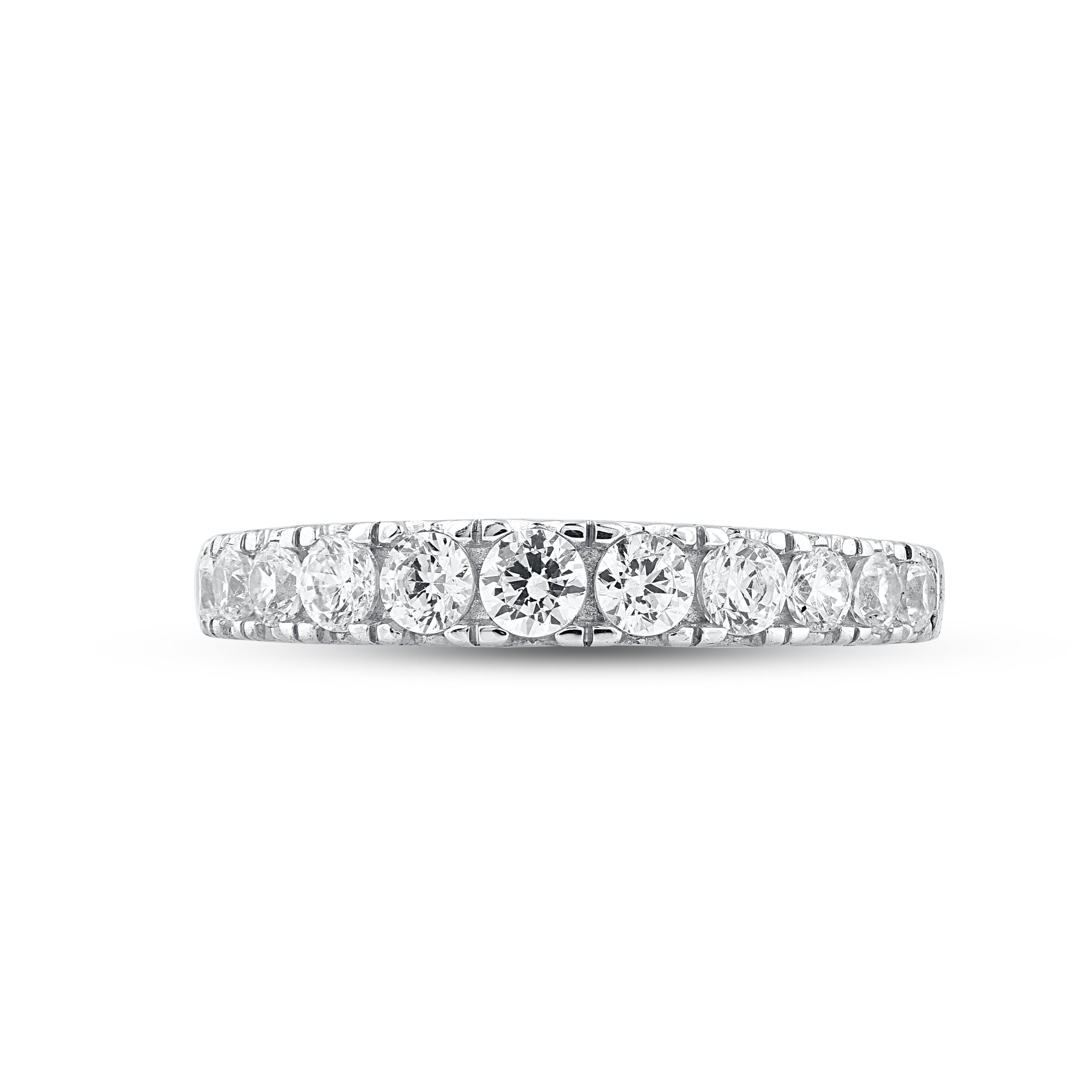 Stunning and classic, this diamond stackable diamond engagement band is crafted in 14K white gold. This engagement band ring is studded with sparkling 11 round white diamonds in secured french setting. The diamonds are natural, not-treated and