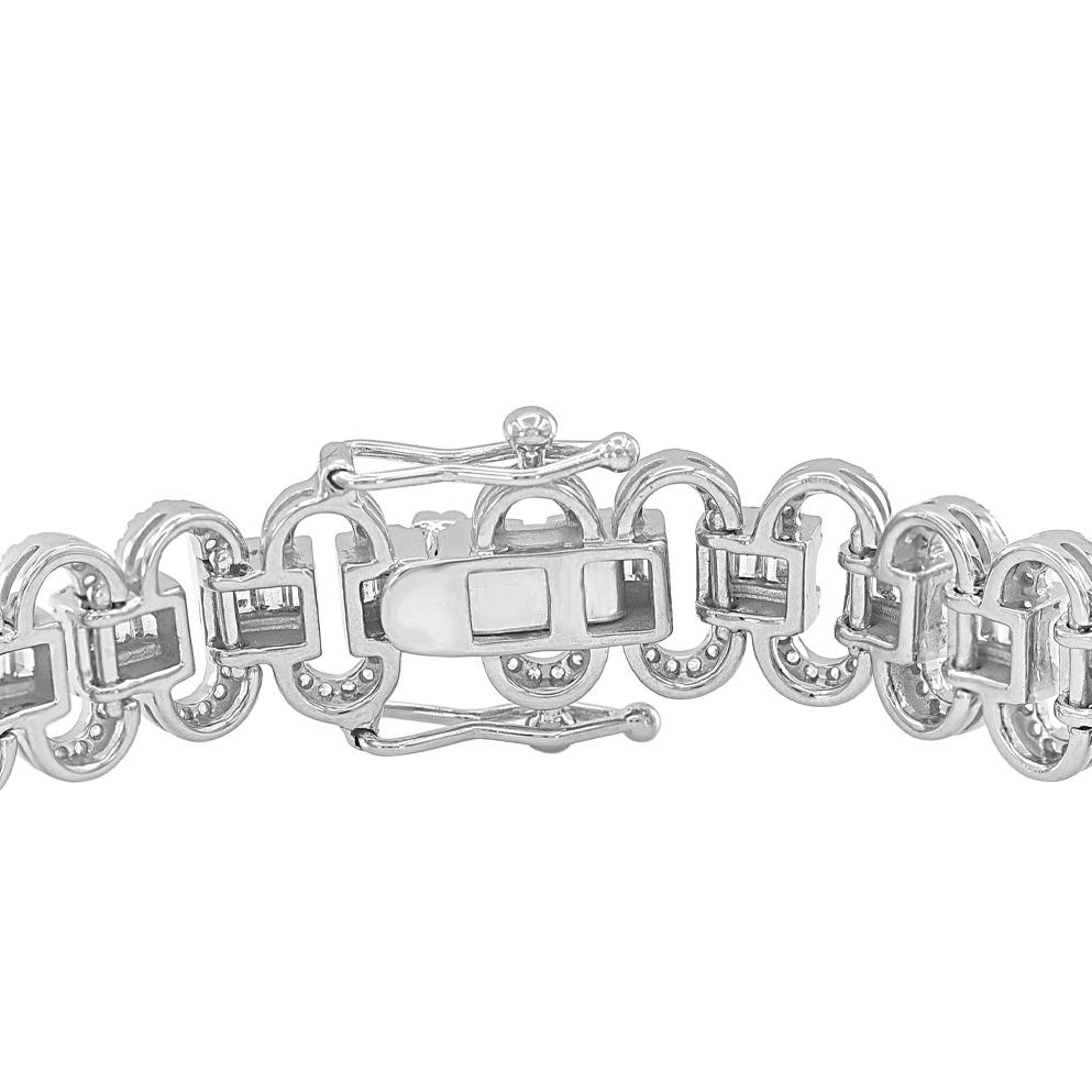 Simply stunning, this diamond wedding bracelet adds easy elegance to your casual or dressy attire. Crafted in 14 Karat white gold and embellished with 901 round single cut & baguette cut natural diamond in prong and channel setting. The total
