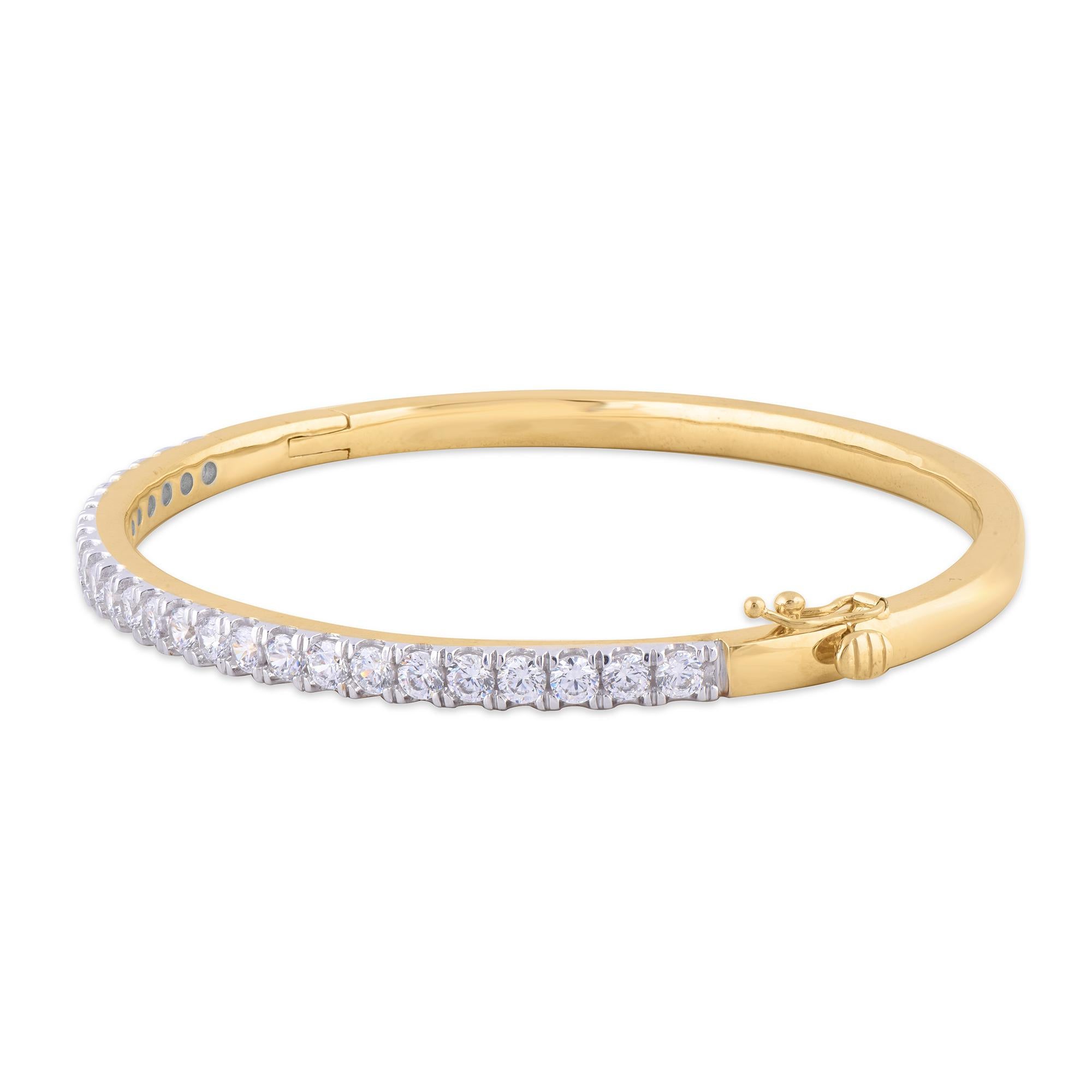 Add a touch of sparkle to any look with these designer diamond bangle. Dazzles with 25 brilliant round-cut diamond set in micro-prong setting. The total diamond weight is 3.00 Carat and shines brightly in H-I color I1 clarity.