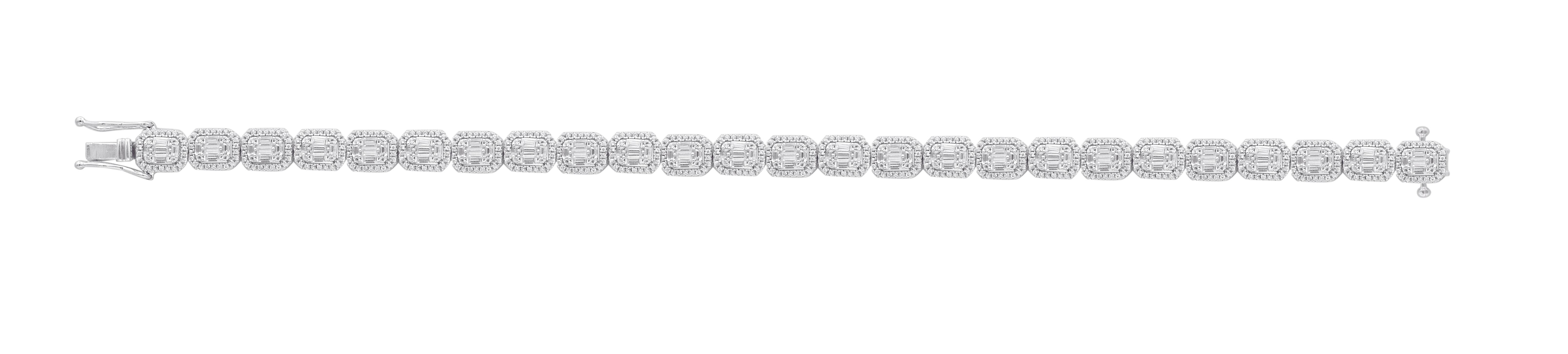 Make your wrist dazzle with designer bracelet. This bracelet is studded with 775 single cut & baguette diamonds elegantly set in prong setting and designed beautifully in 18KT White Gold. The diamonds are graded H-I Color, I2 Clarity.