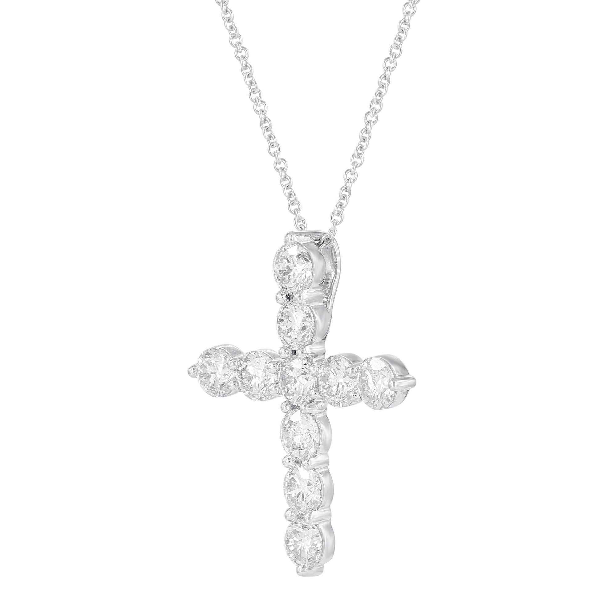 Bring charm to your look with this diamond cross pendant. The pendant is crafted from 18-karat white gold and features Round Brilliant 10 white diamonds in prong set, G-H color SI1-2 clarity and a high polish finish complete the Brilliant