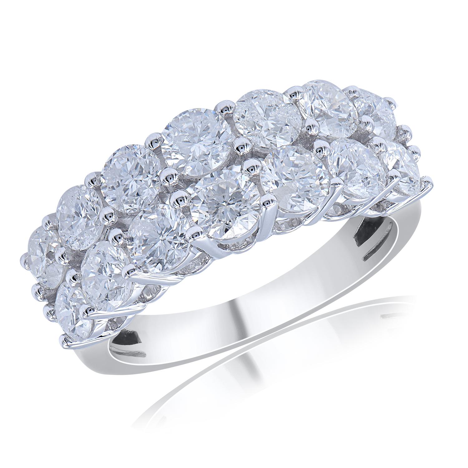 Glitters with 14 round-cut diamonds in prong setting and crafted in 14 KT white gold (H-I Color, I3 Clarity) This half eternity diamond studded wedding ring is sure to make you stand out. This sparkling diamond wedding band is a classic favorite