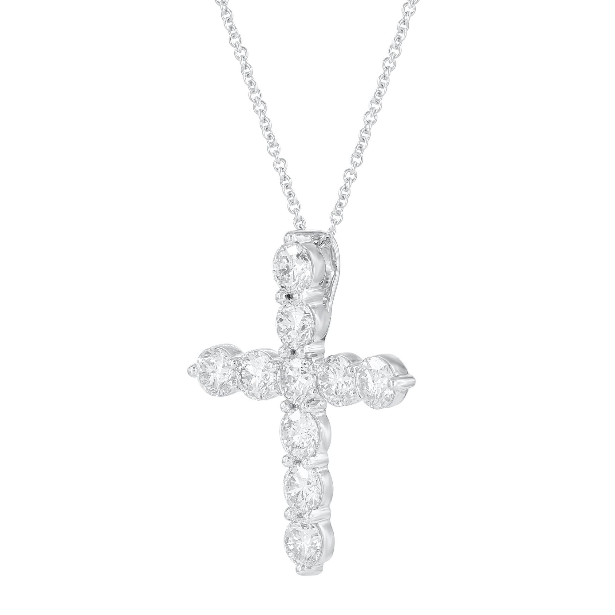 Bring charm to your look with this diamond cross pendant. The pendant is crafted from 18-karat white gold and features Round Brilliant 10 white diamonds in Prongset, G-H color SI1-2 clarity and a high polish finish complete the Brilliant