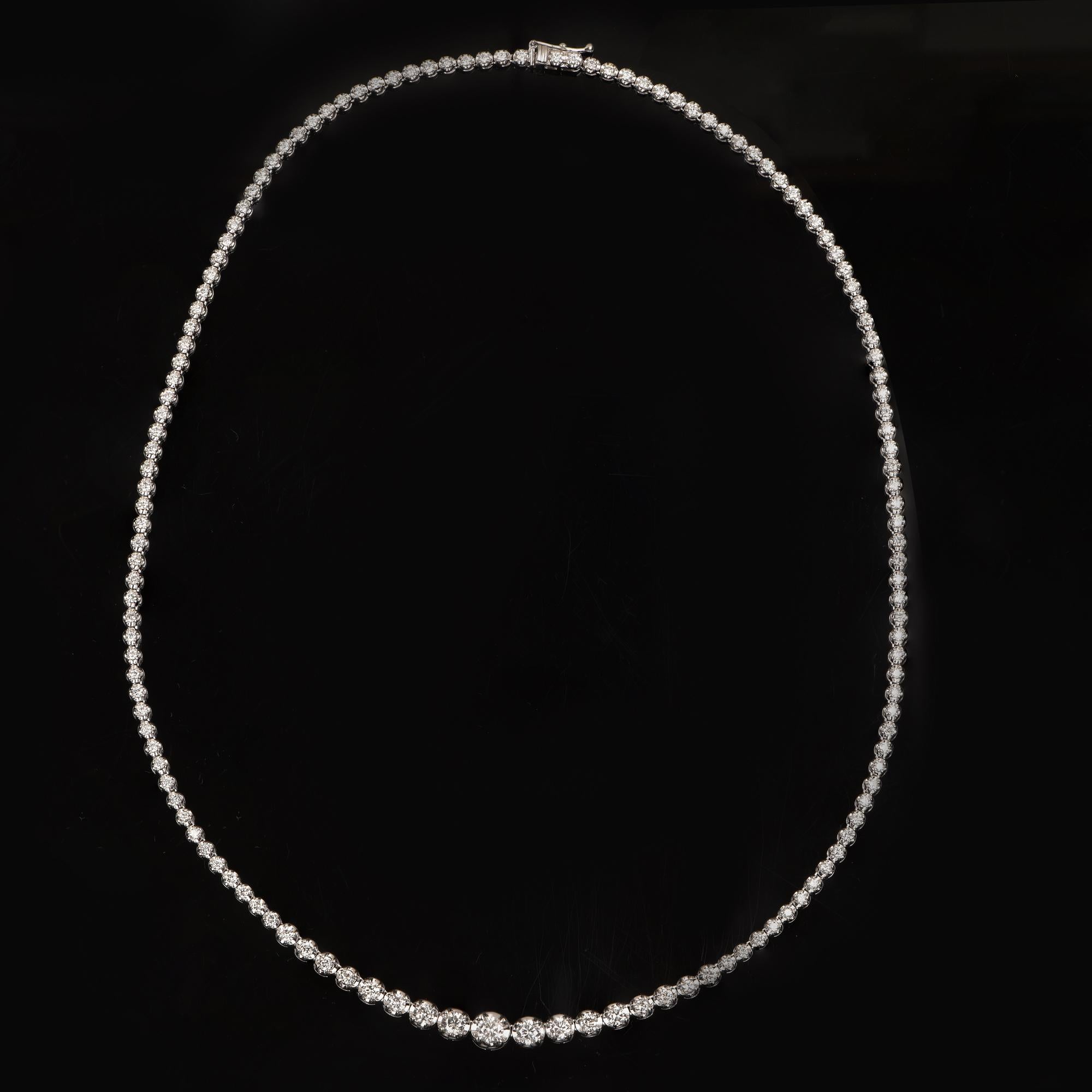 This classy and timeless diamond necklace is crafted in 14-karat white gold and accentuated with 138 brilliant-cut diamonds in prong setting. The diamonds in this stunning necklace are graded H-I Color, I2 Clarity. 

This piece is made to order.
