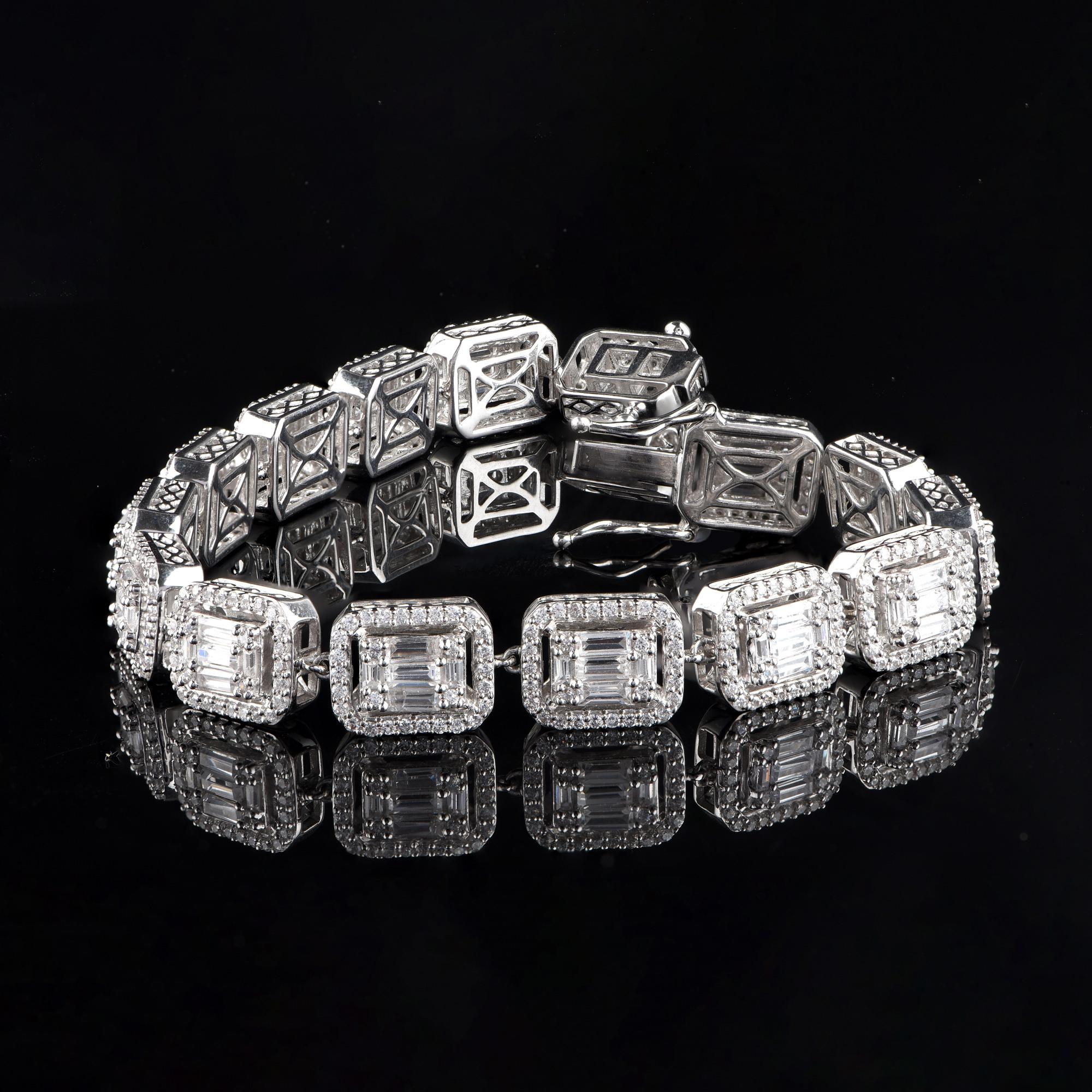 Scintillating with 450 brilliant and 75 baguette-cut diamonds beautifully set in prong setting and designed in 18-karat white gold. Diamonds are graded H-I Color, I2 Clarity. 

This piece is made to order, please allow 2-3 weeks for manufacturing.