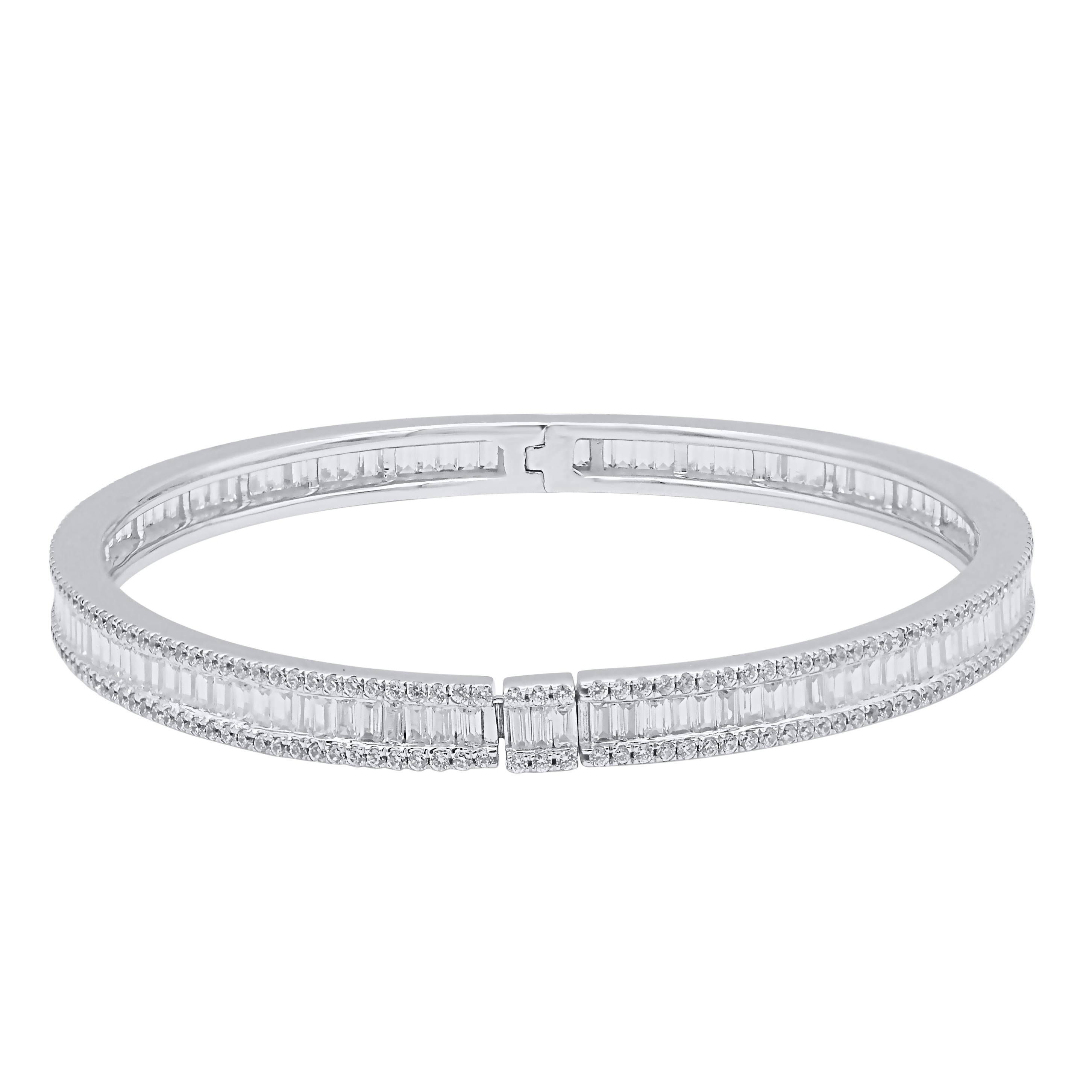 Classic and sophisticated, this diamond bangle bracelet pairs well with any attire.
This Shimmering bangle bracelet features 480 natural round single cut & baguette diamonds in prong and channel setting and crafted in 14kt white gold. Diamonds are